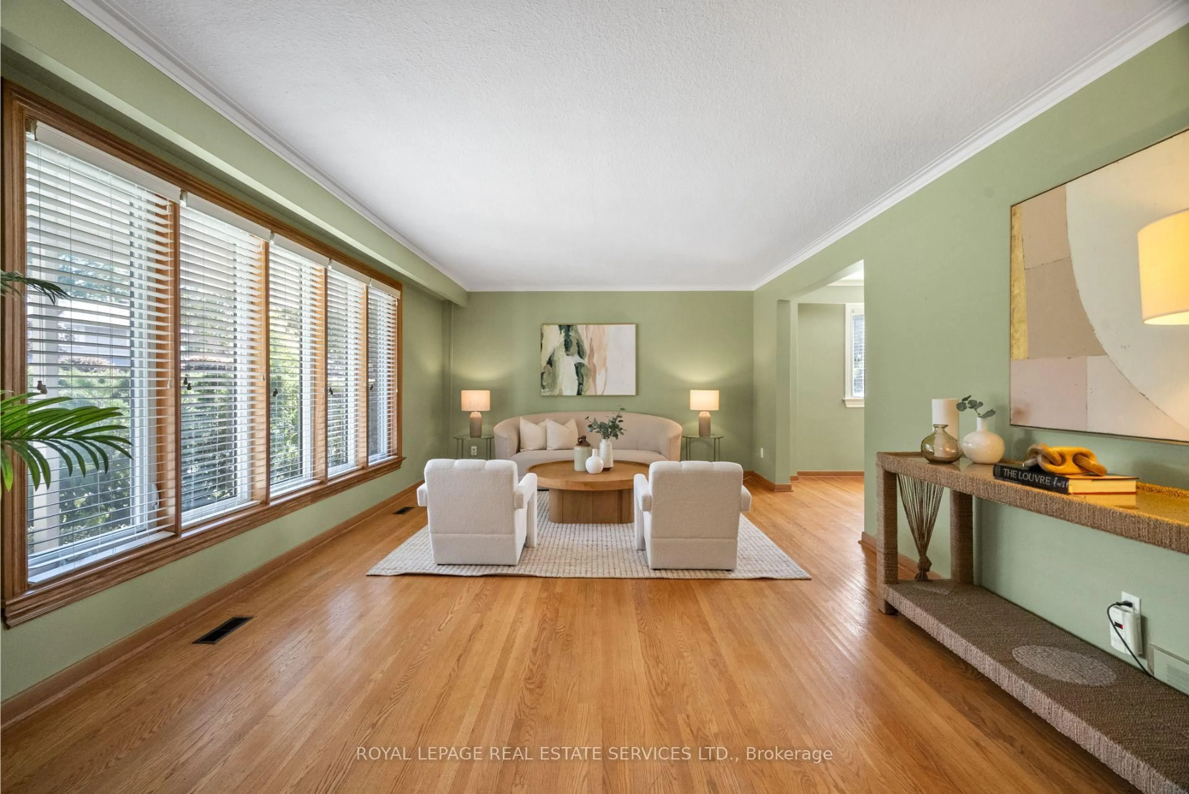 Living room with furniture, wood/laminate floor for 6 Longfield Rd, Toronto Ontario M9B 3E7