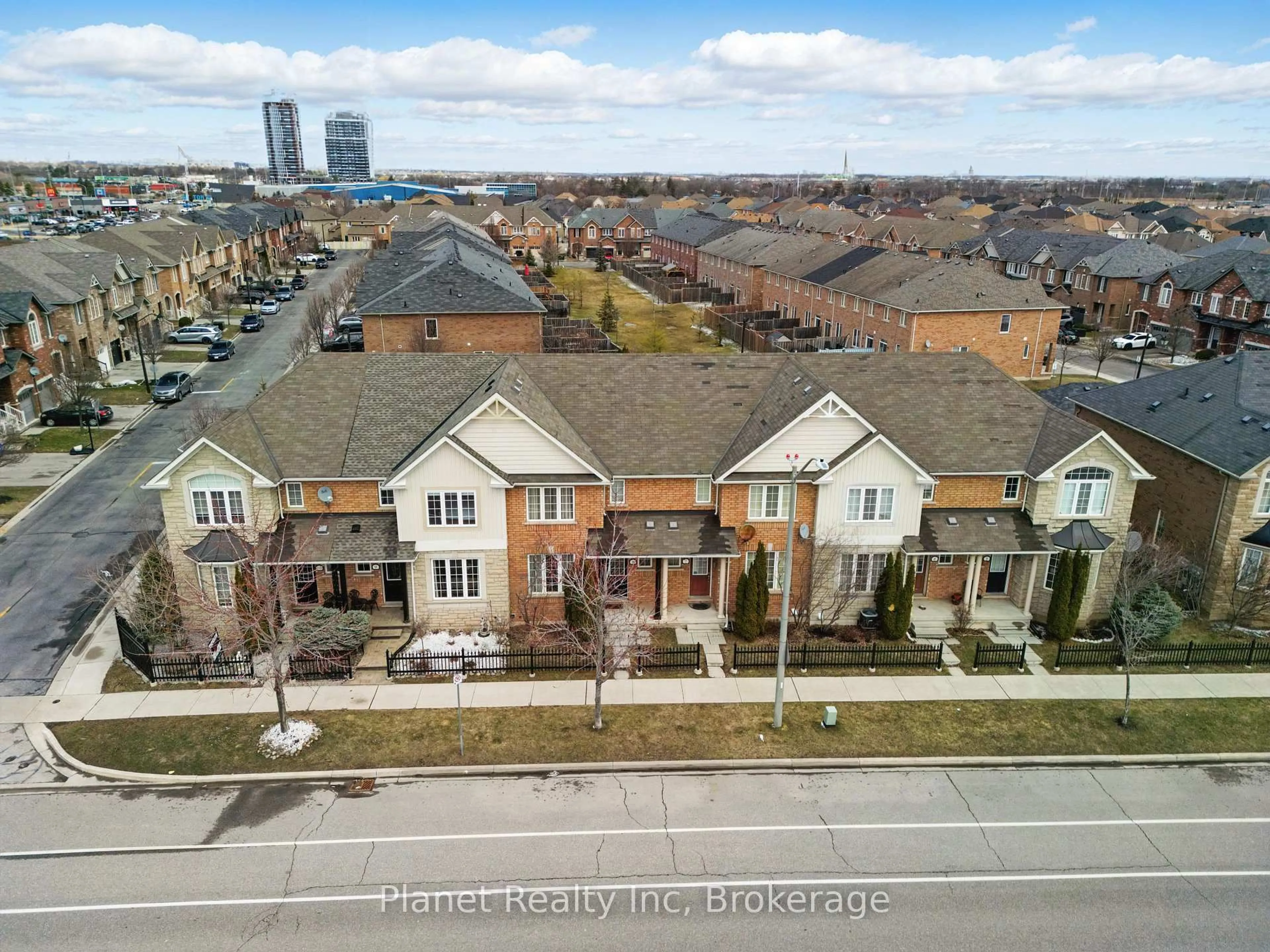 A pic from outside/outdoor area/front of a property/back of a property/a pic from drone, city buildings view from balcony for 651 Farmstead Dr #9, Milton Ontario L9T 7W2