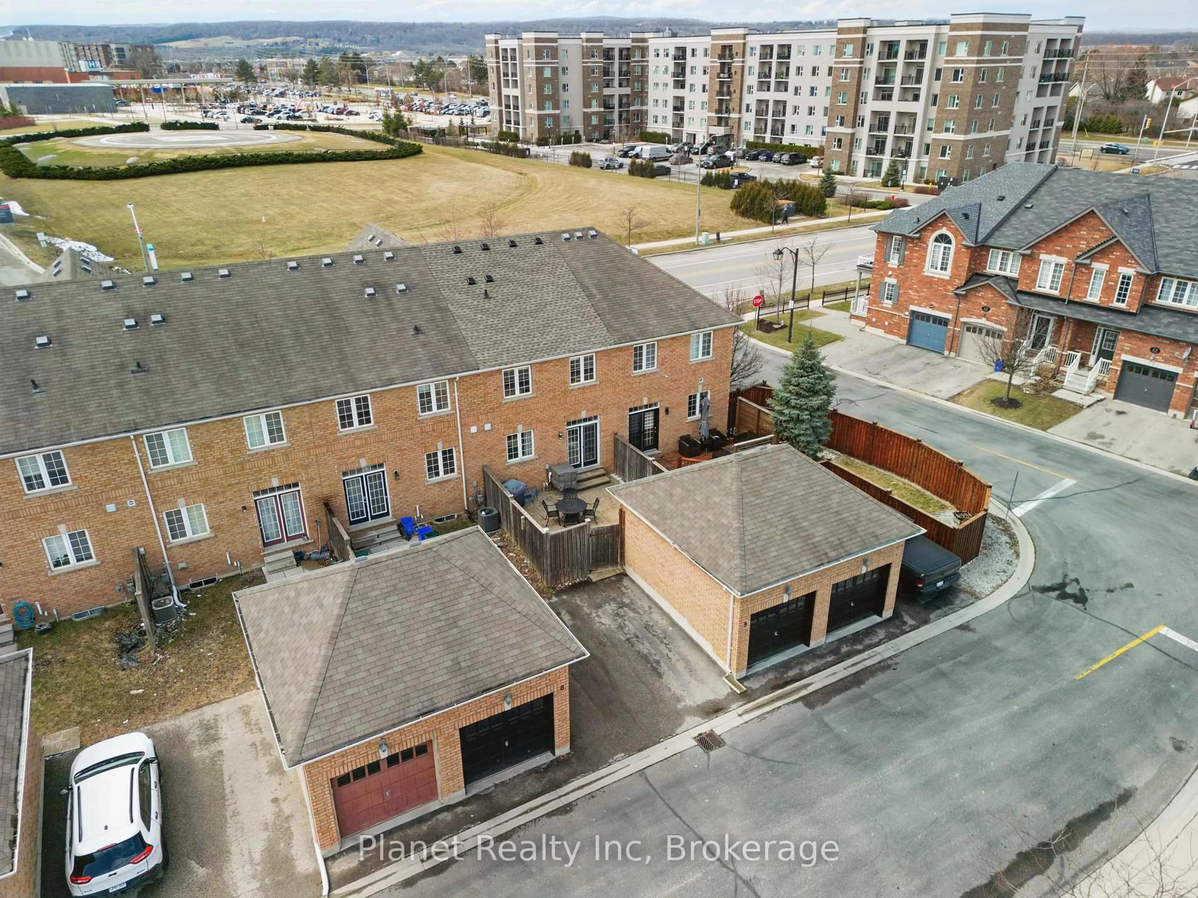 A pic from outside/outdoor area/front of a property/back of a property/a pic from drone, city buildings view from balcony for 651 Farmstead Dr #9, Milton Ontario L9T 7W2