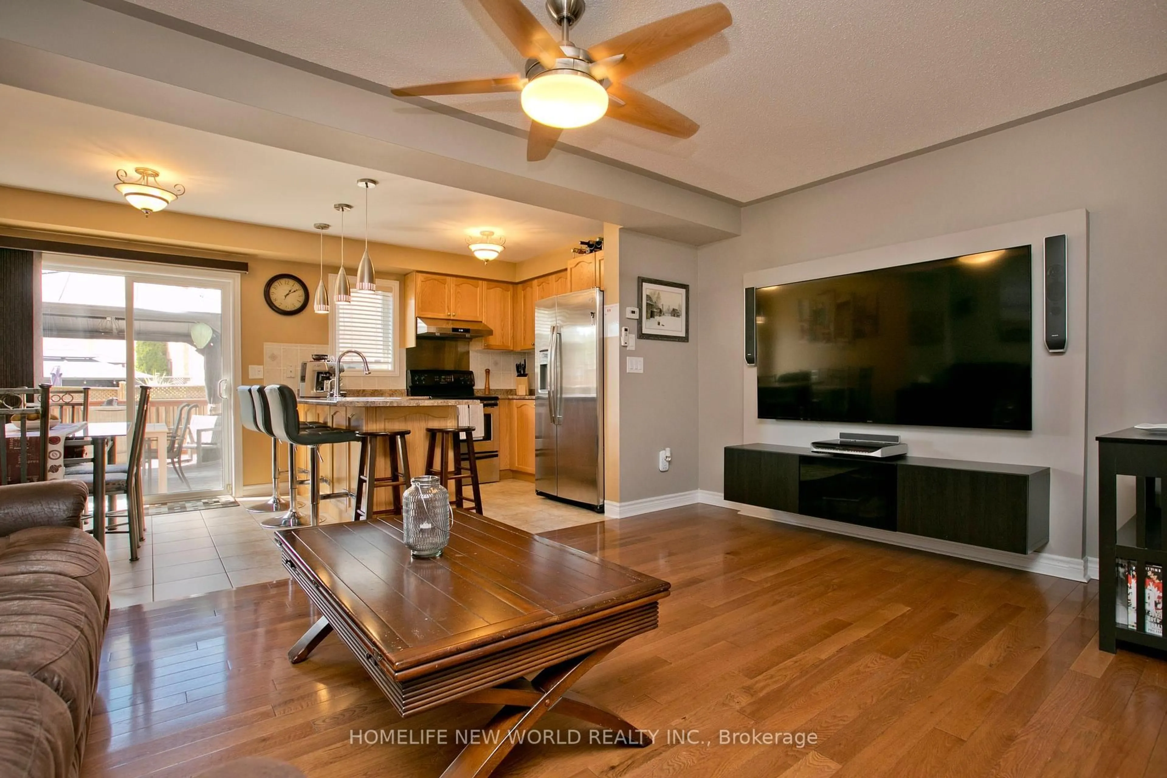 Open concept kitchen, wood/laminate floor for 54 Brussels Ave, Brampton Ontario L6Z 0A5
