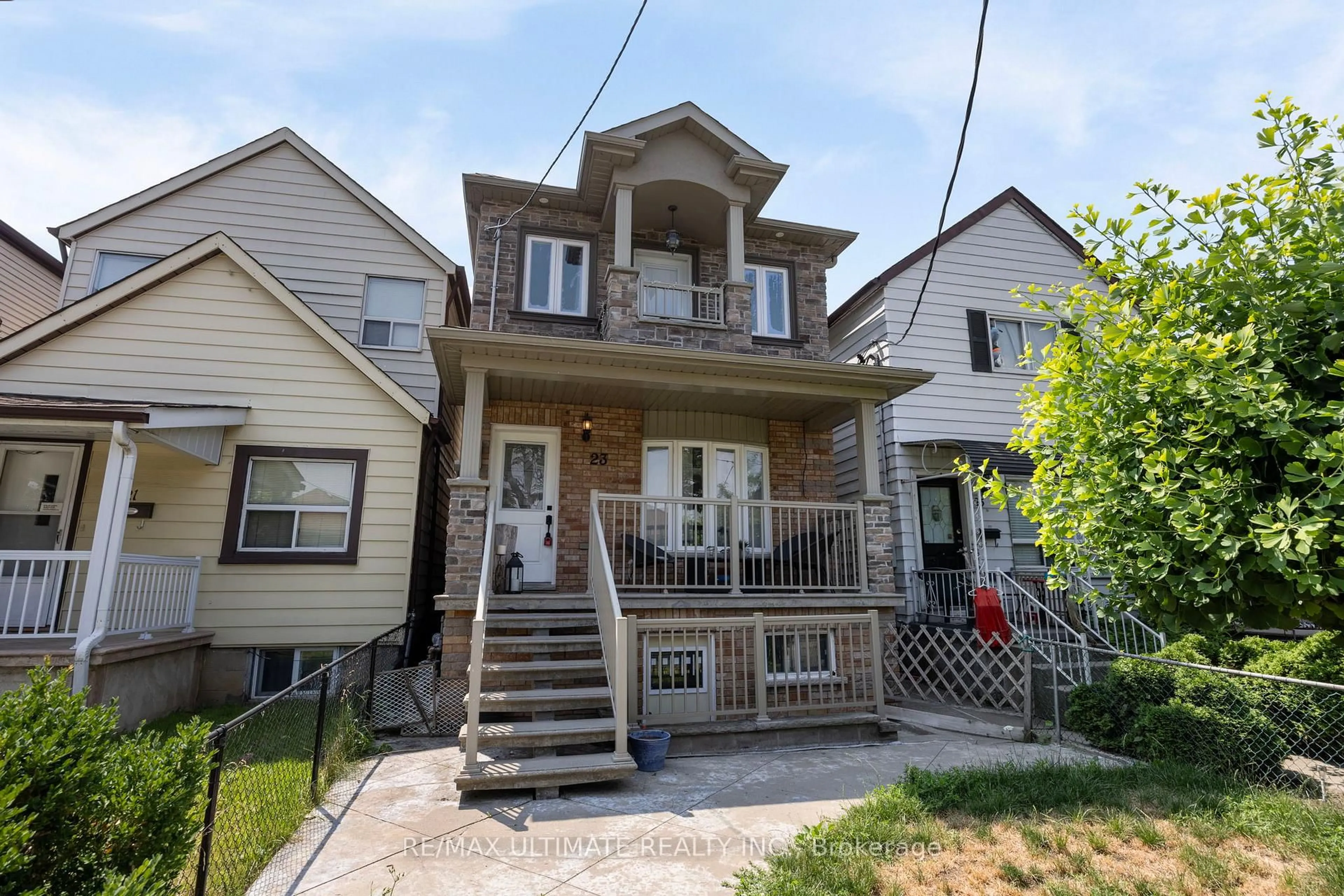 Home with vinyl exterior material, street for 23 Seneca Ave, Toronto Ontario M5J 2A4