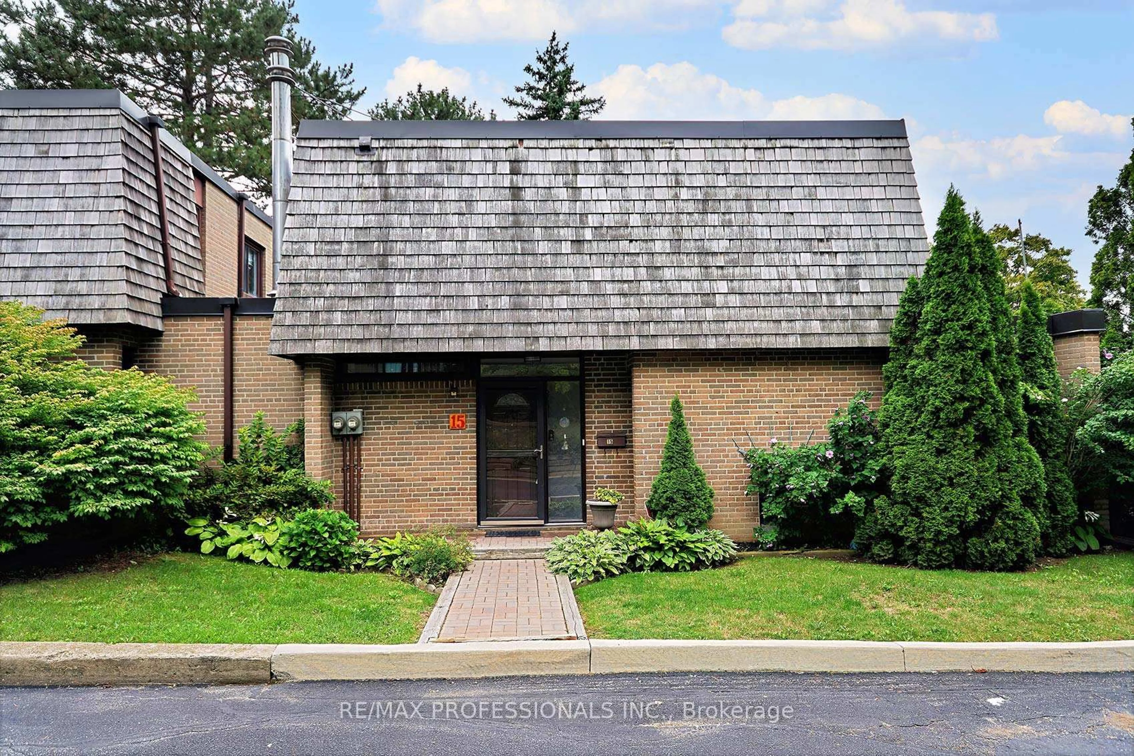 Home with brick exterior material, street for 15 Raintree Path, Toronto Ontario M9C 5A9