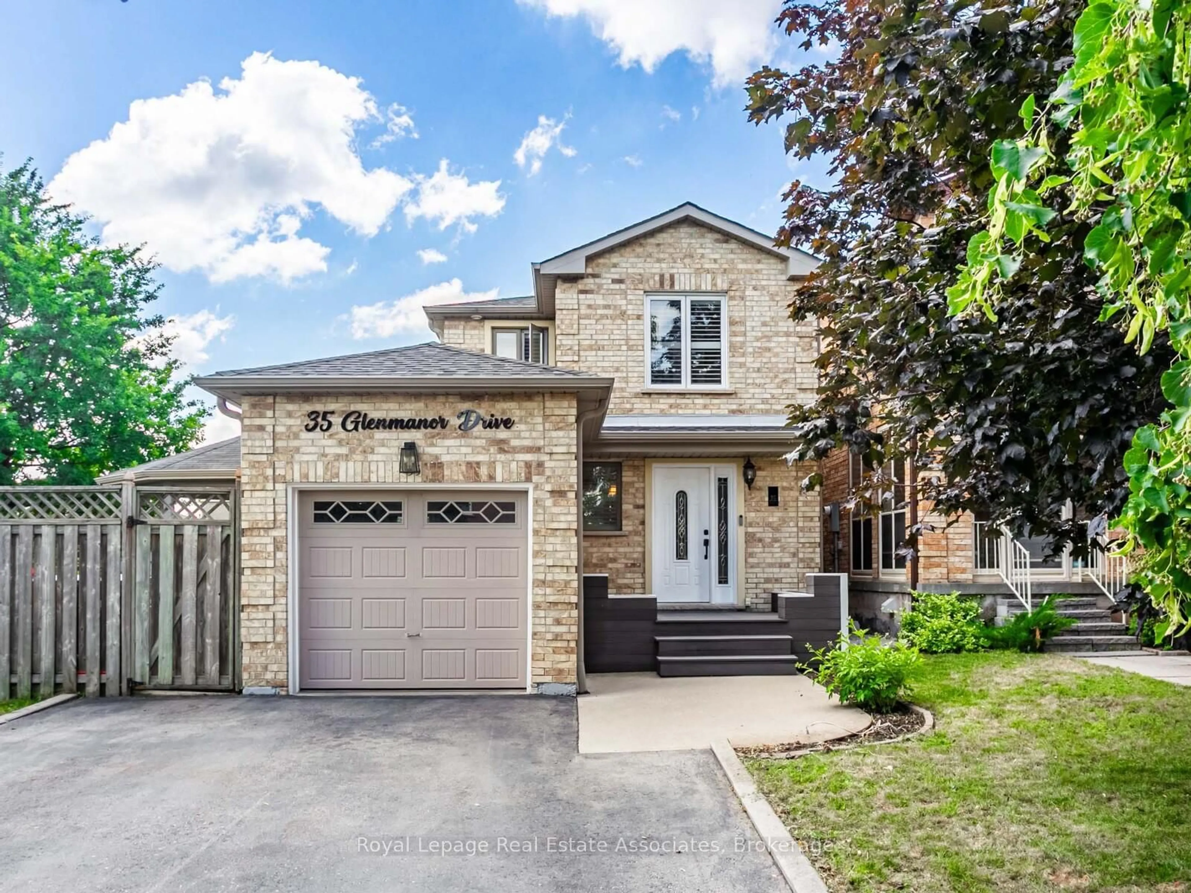 Home with brick exterior material, street for 35 Glenmanor Dr, Brampton Ontario L6Z 3Z1