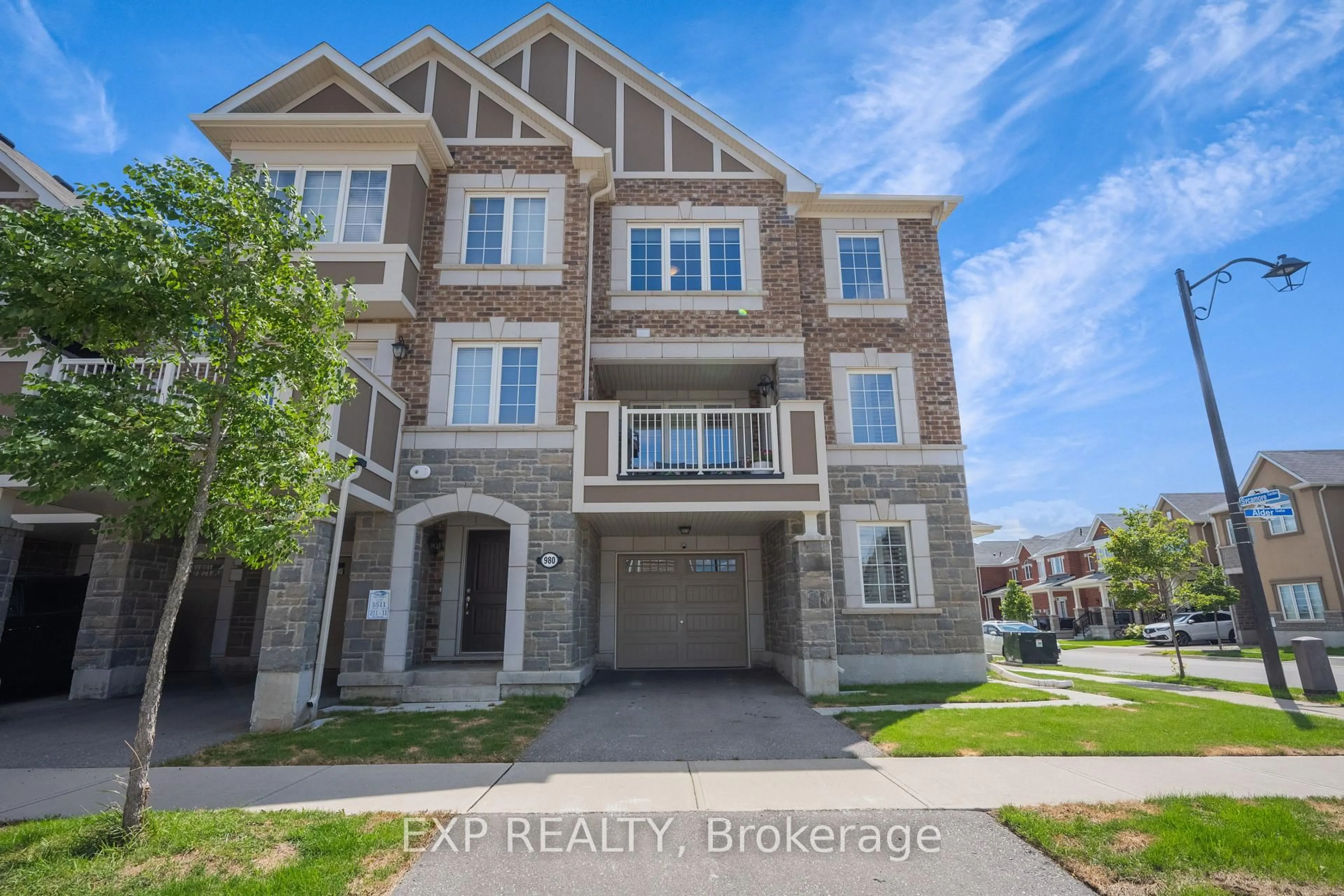 Home with brick exterior material, street for 978 Alder Gate, Milton Ontario L9E 1R6