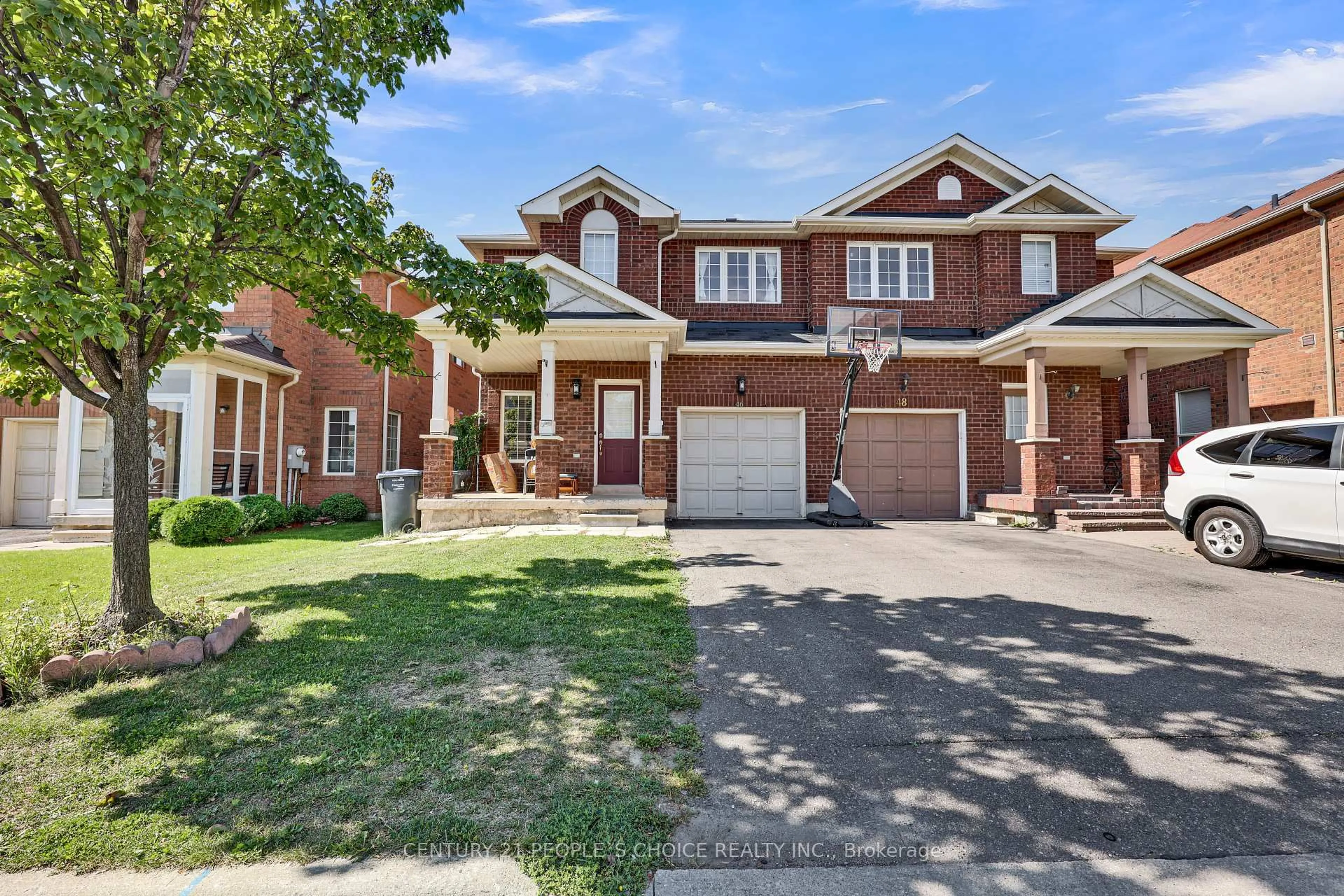 Home with brick exterior material, street for 46 Commodore Dr, Brampton Ontario L6X 0S7