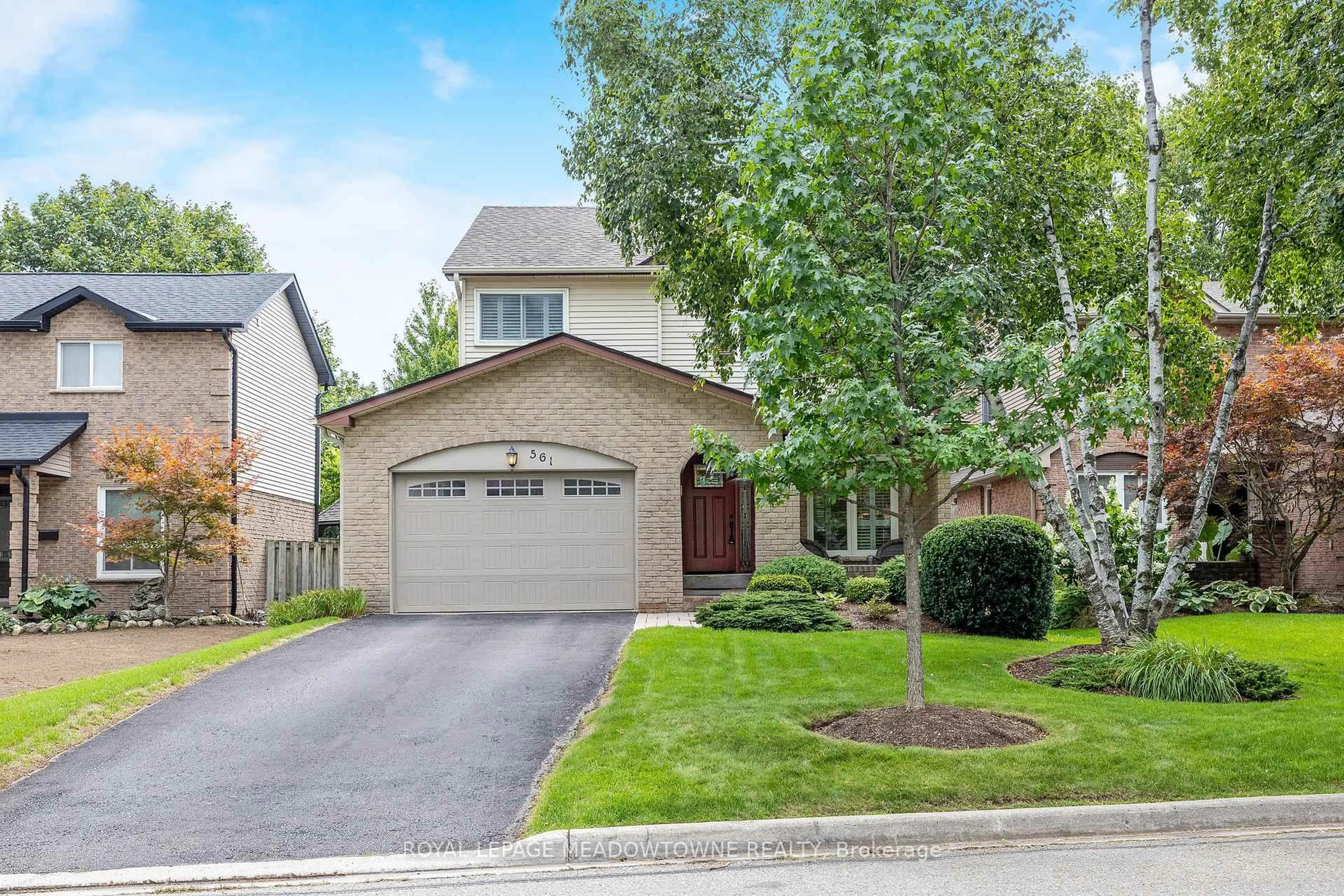 Home with brick exterior material, street for 561 Hawthorne Cres, Milton Ontario L9T 4P8