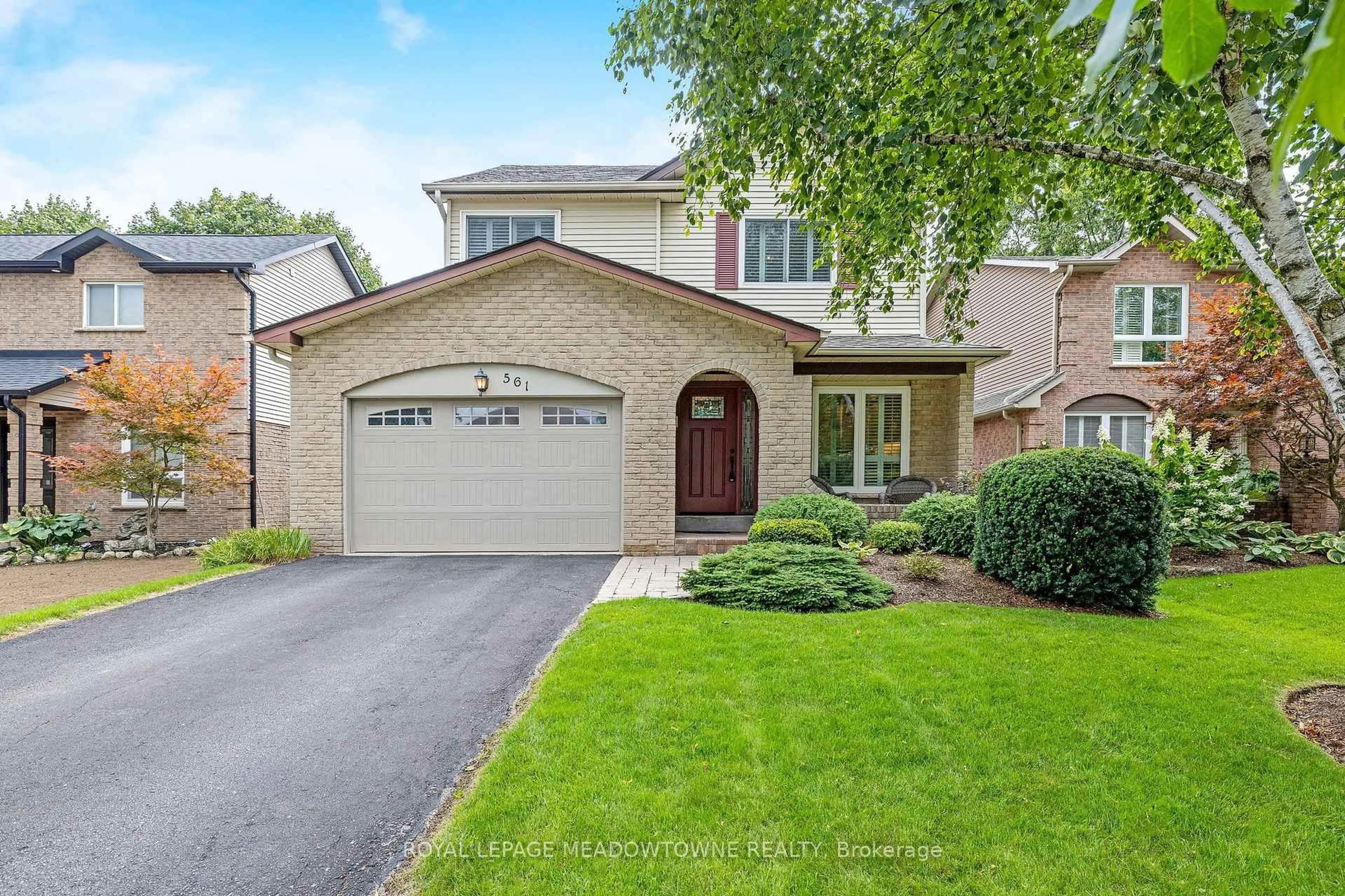 Home with brick exterior material, street for 561 Hawthorne Cres, Milton Ontario L9T 4P8