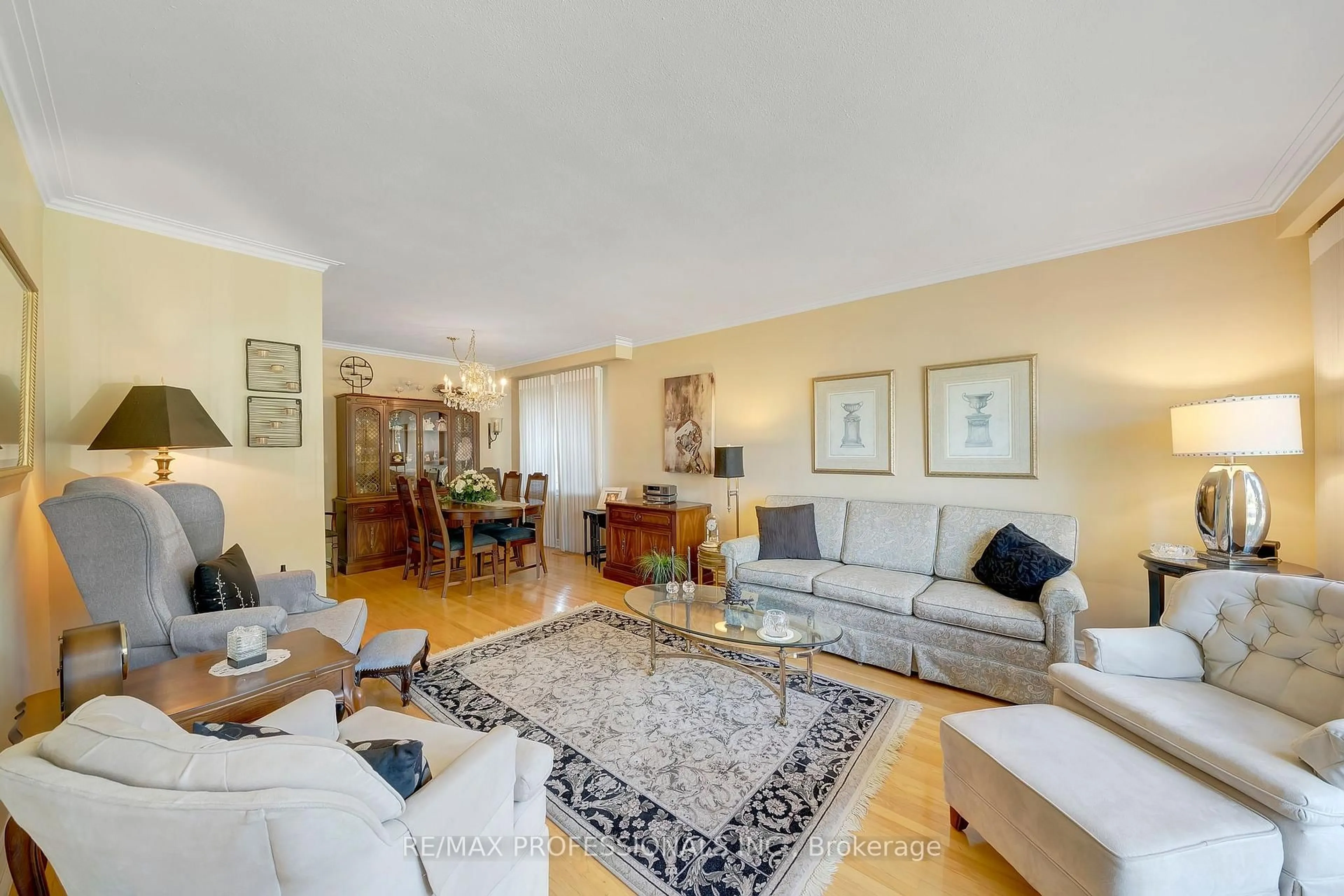 Living room with furniture, unknown for 216 Wellesworth Dr, Toronto Ontario M9C 4S1