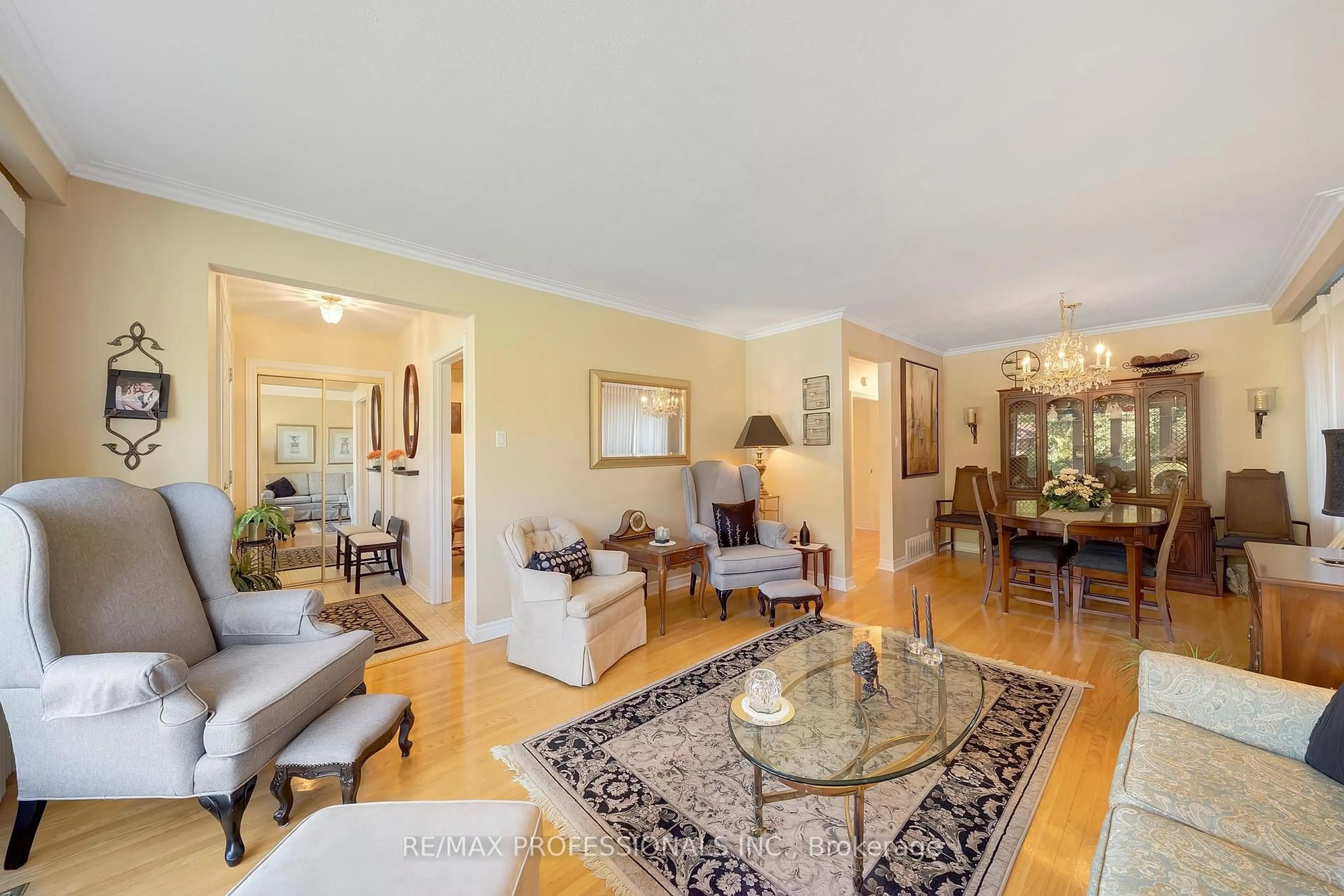 Living room with furniture, unknown for 216 Wellesworth Dr, Toronto Ontario M9C 4S1