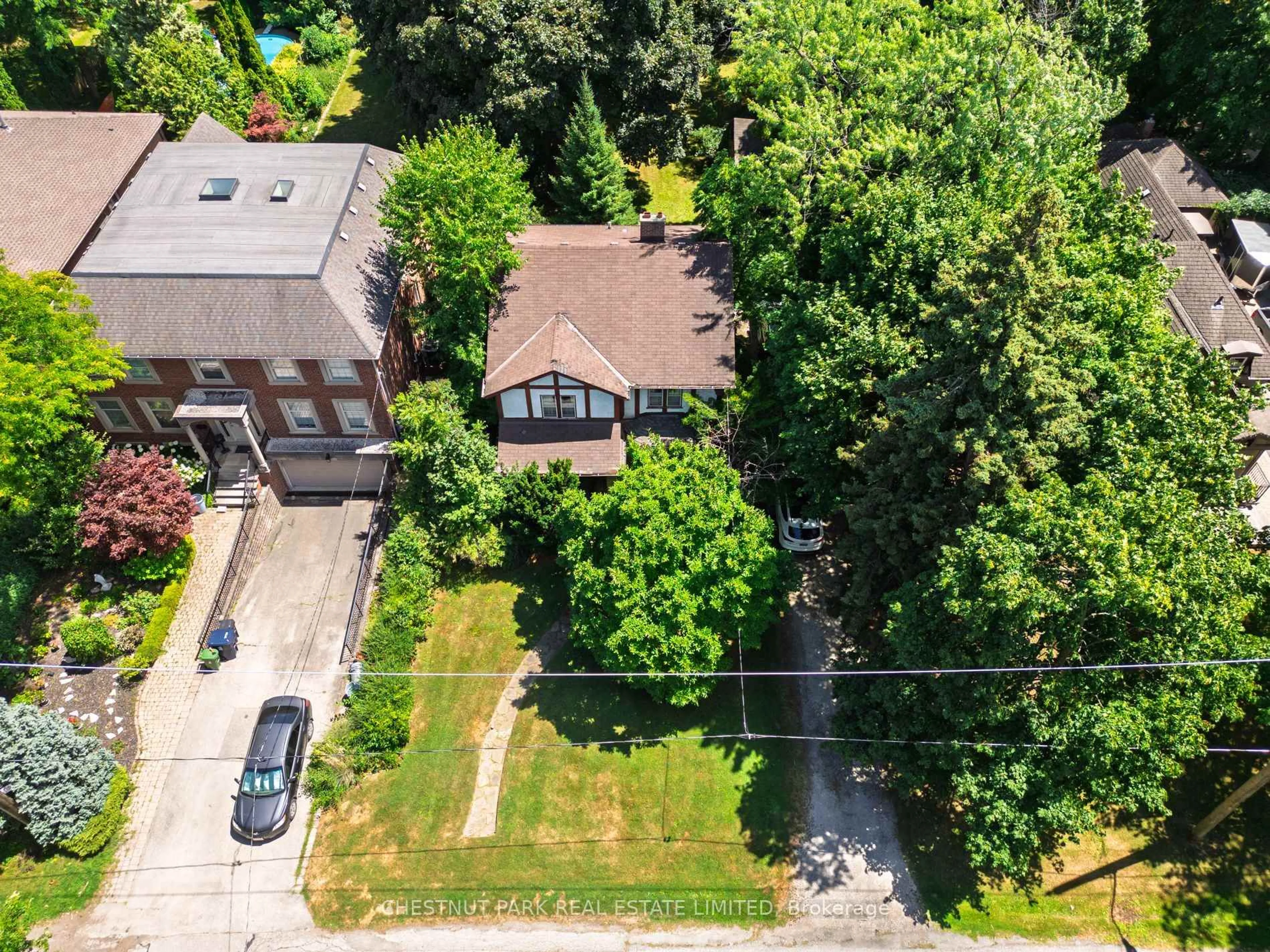 A pic from outside/outdoor area/front of a property/back of a property/a pic from drone, street for 61 Burnhamthorpe Cres, Toronto Ontario M9A 1G6