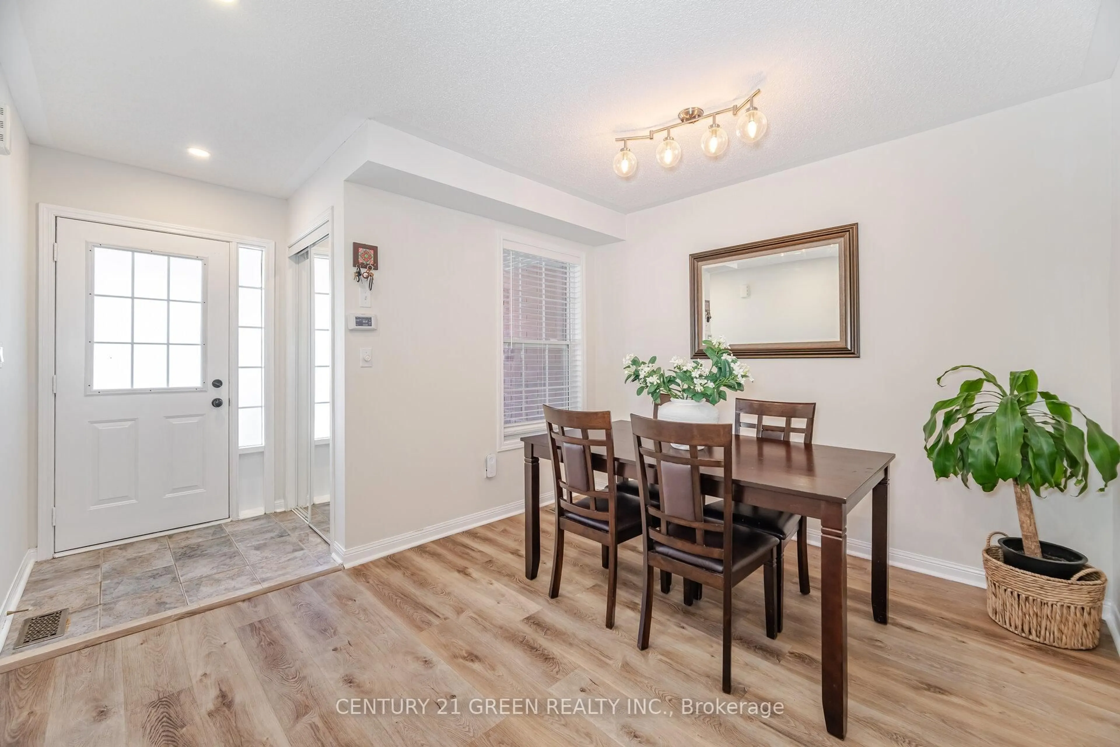 Dining room, wood/laminate floor for 411 Baverstock Cres, Milton Ontario L9T 5L1