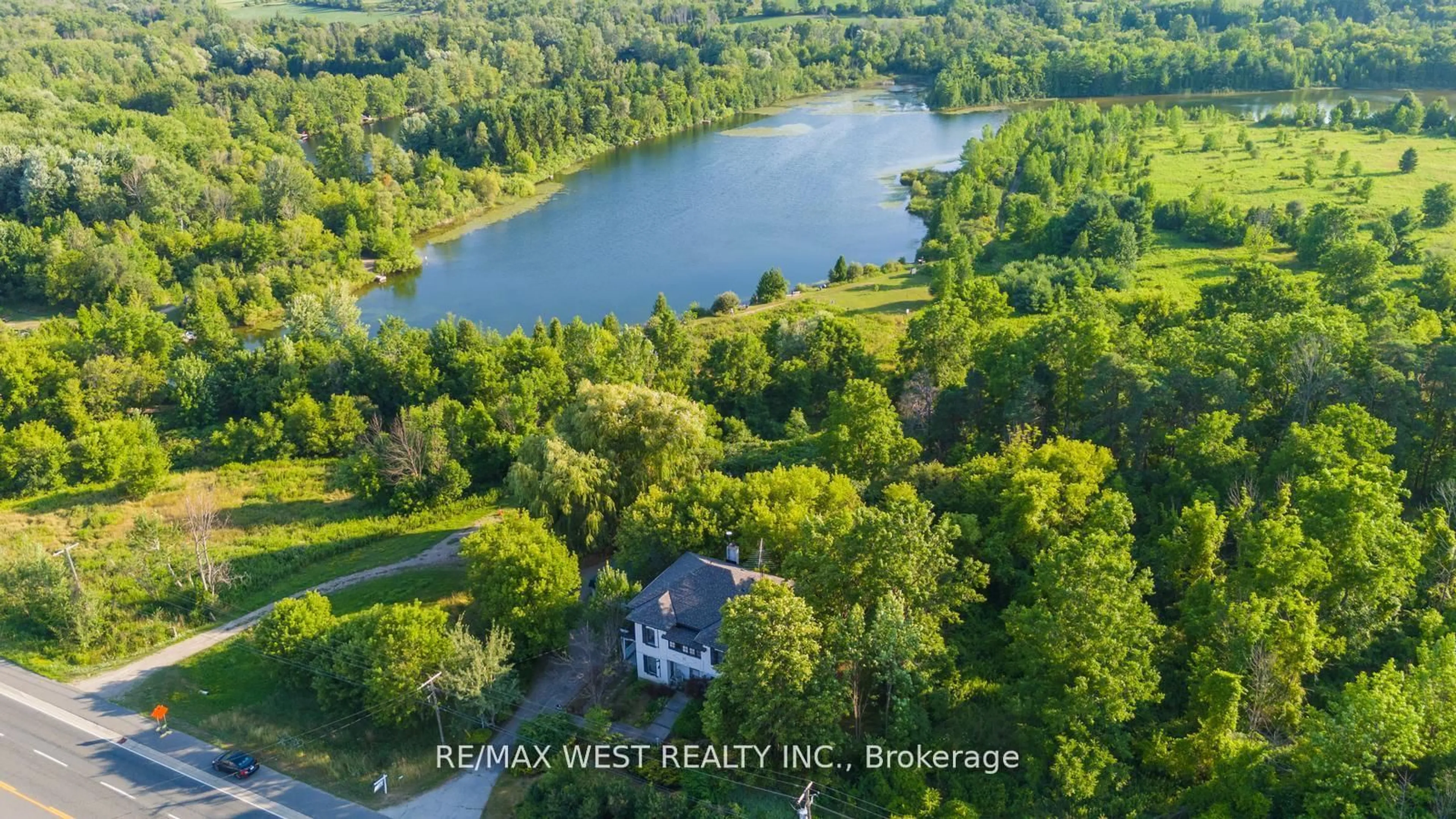 A pic from outside/outdoor area/front of a property/back of a property/a pic from drone, water/lake/river/ocean view for 16086 Hurontario St, Caledon Ontario L7C 2C5