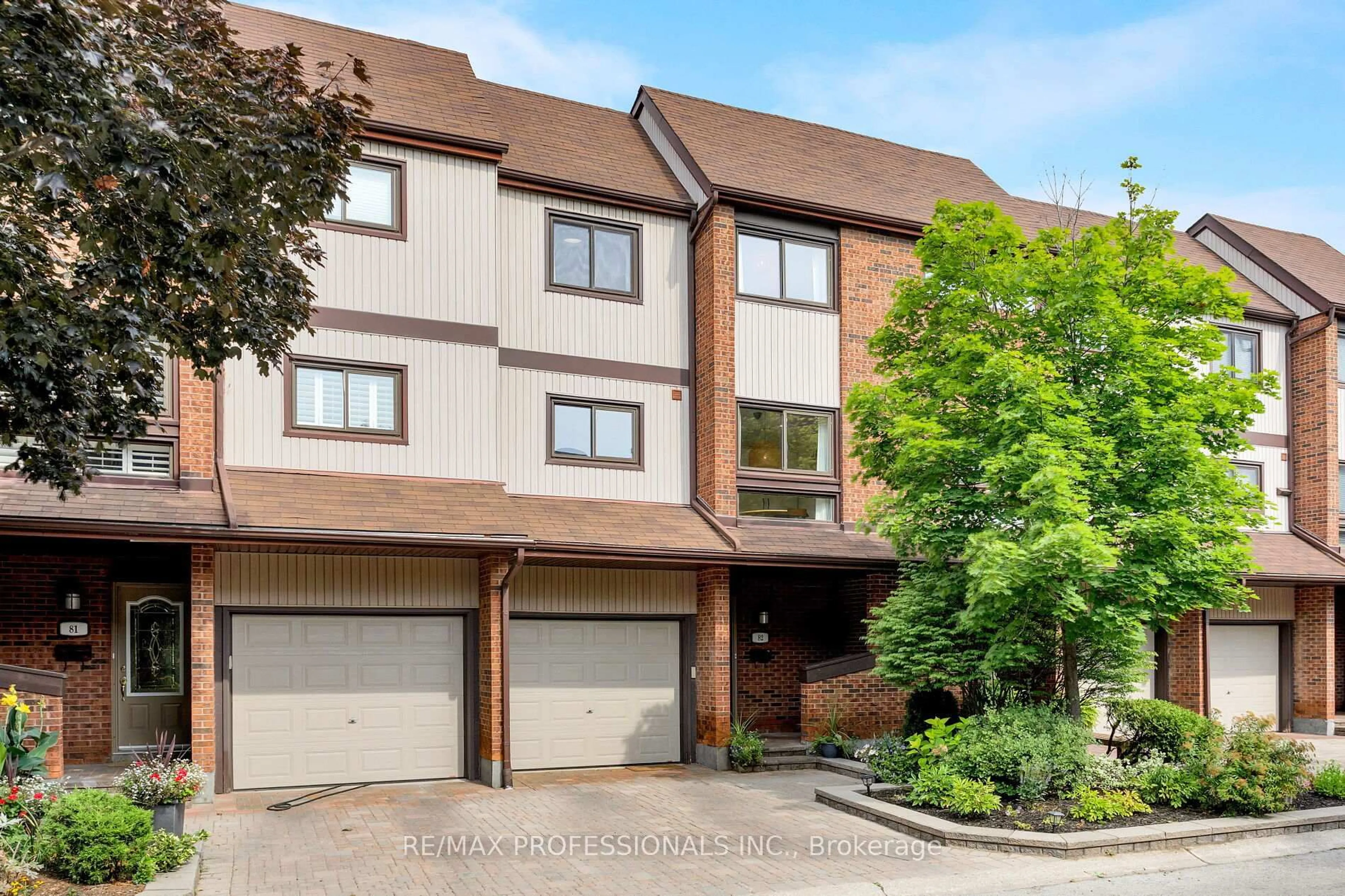 Home with brick exterior material, street for 1080 Walden Circ #82, Mississauga Ontario M5J 3M9