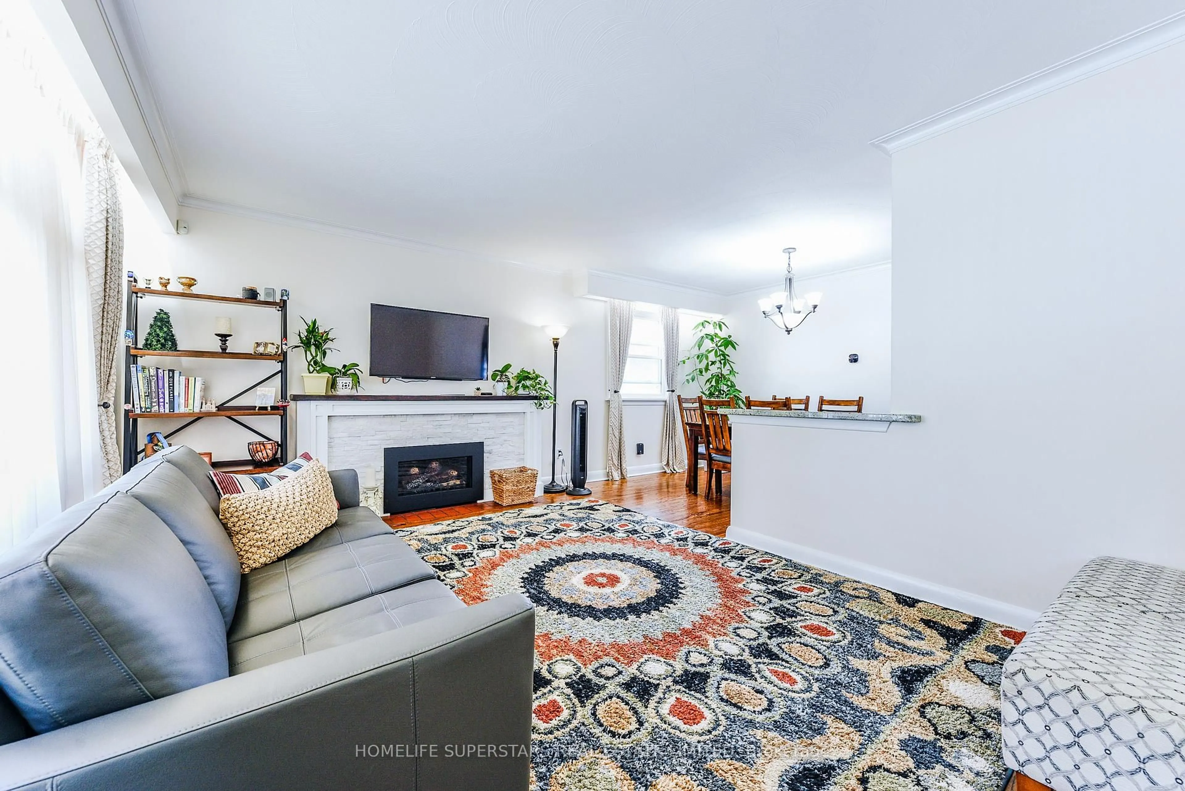 Living room with furniture, unknown for 3987 Bloor St, Toronto Ontario M9B 1M2