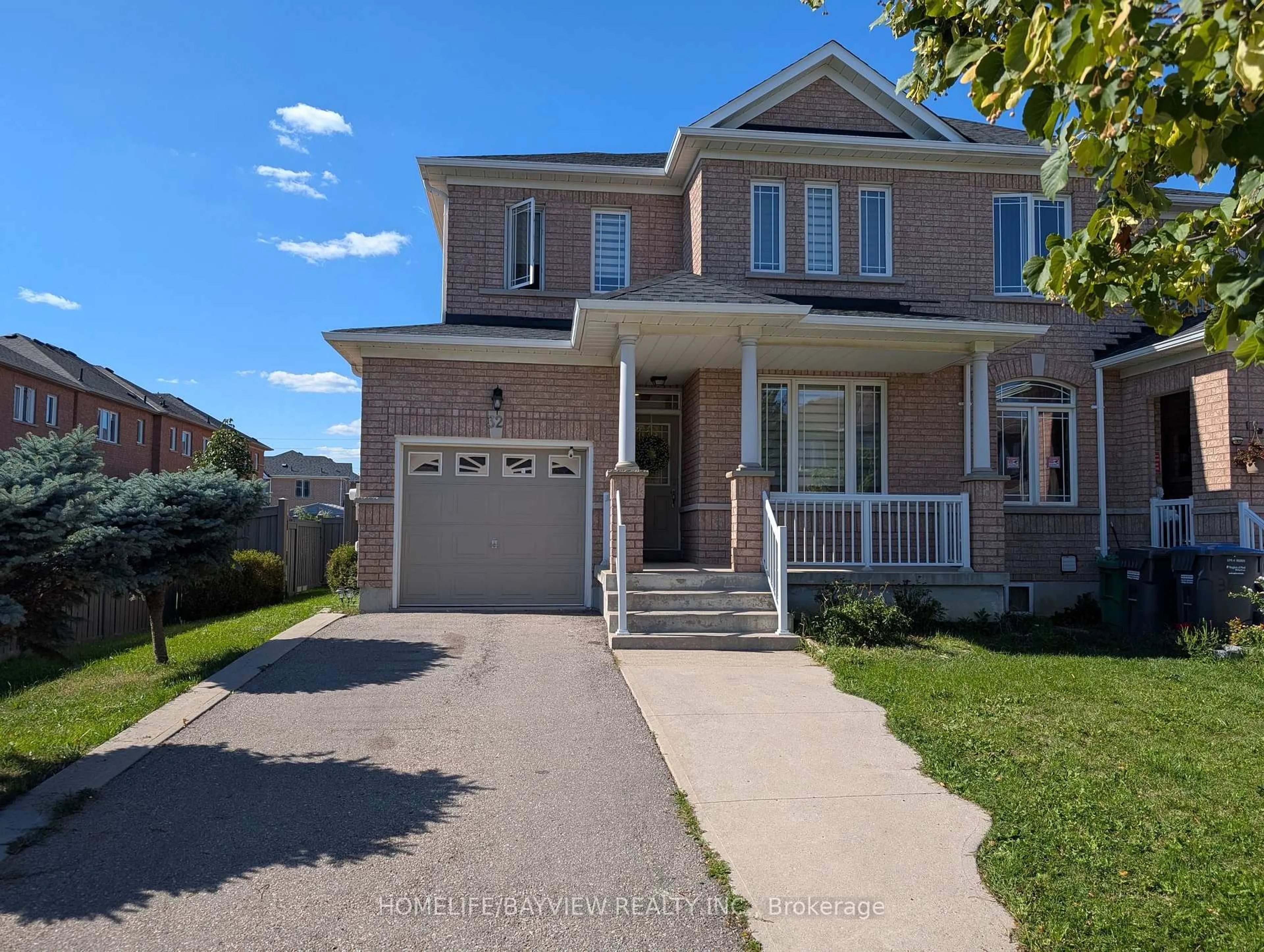 Home with brick exterior material, street for 32 Devonsleigh Dr, Brampton Ontario L7A 3S3