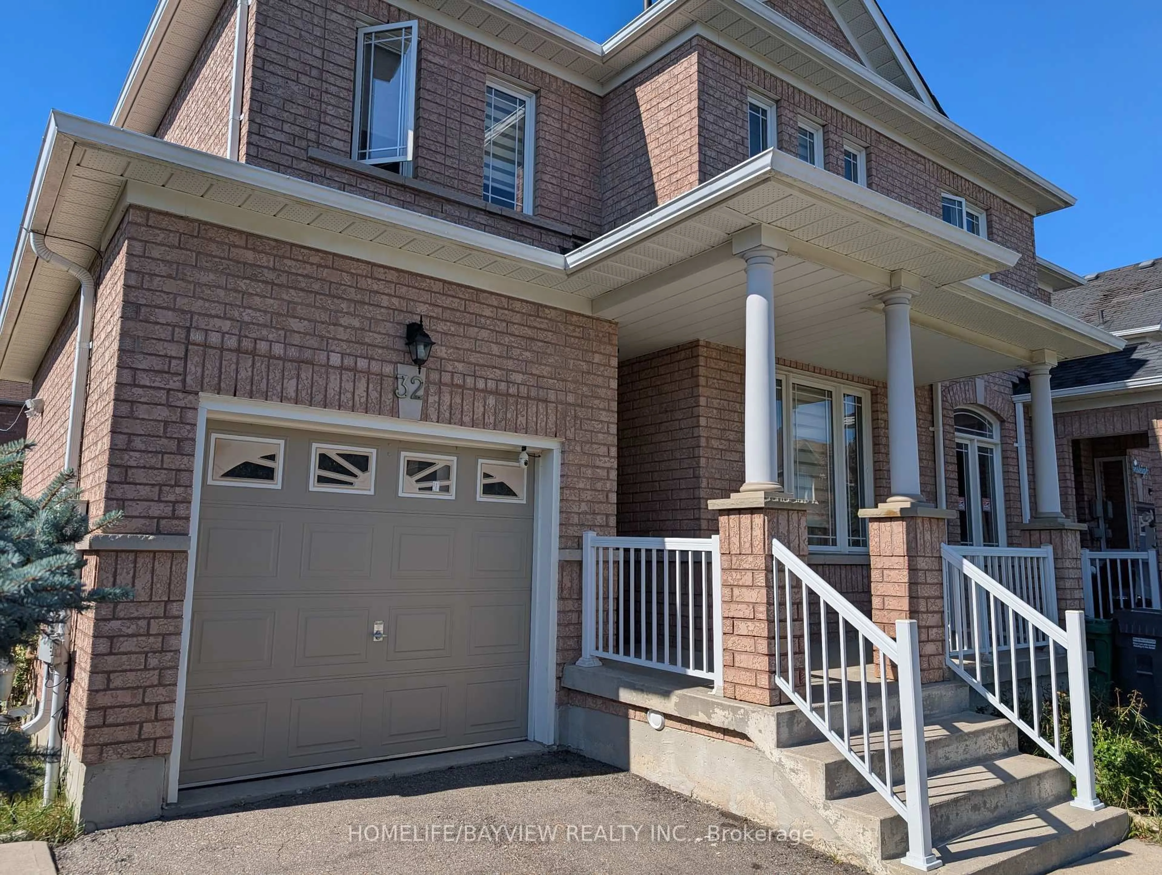 Home with brick exterior material, street for 32 Devonsleigh Dr, Brampton Ontario L7A 3S3