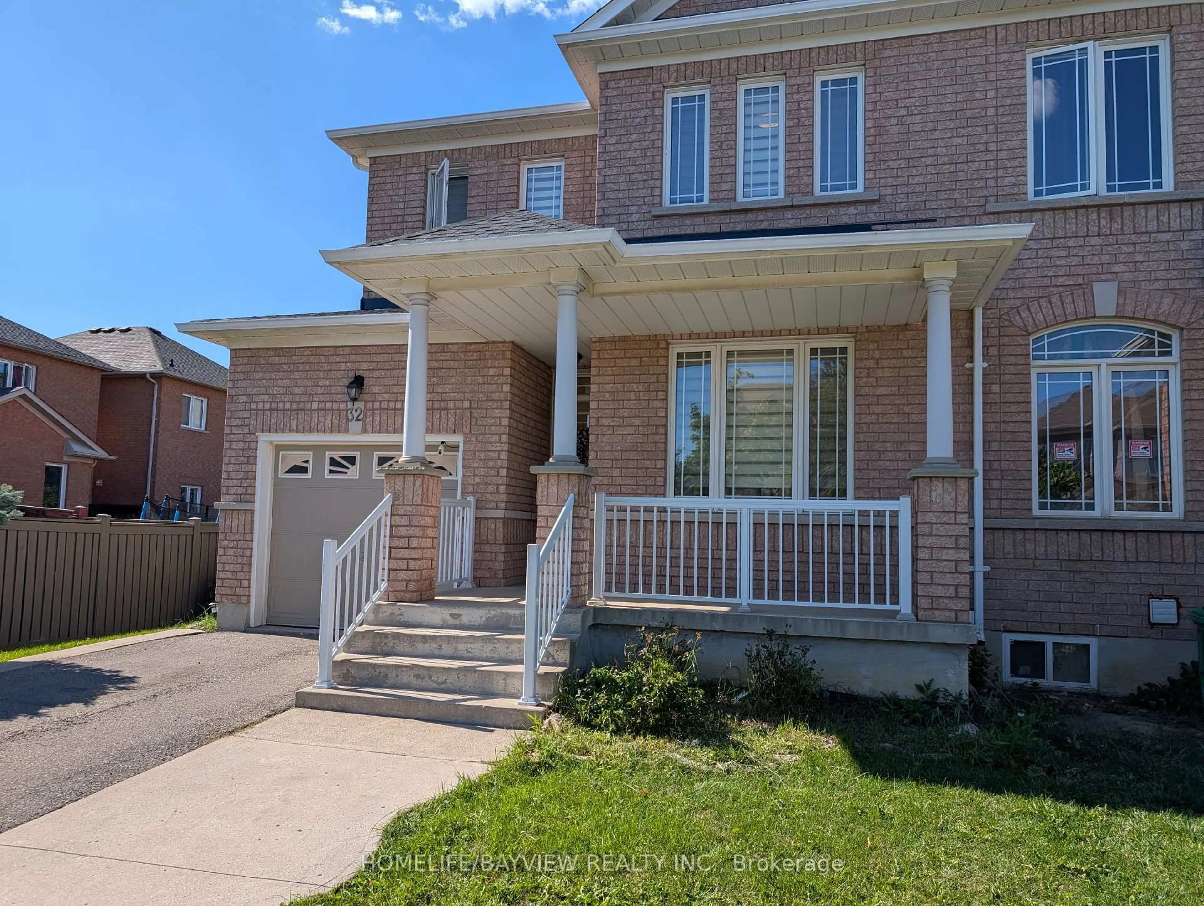 Home with brick exterior material, street for 32 Devonsleigh Dr, Brampton Ontario L7A 3S3