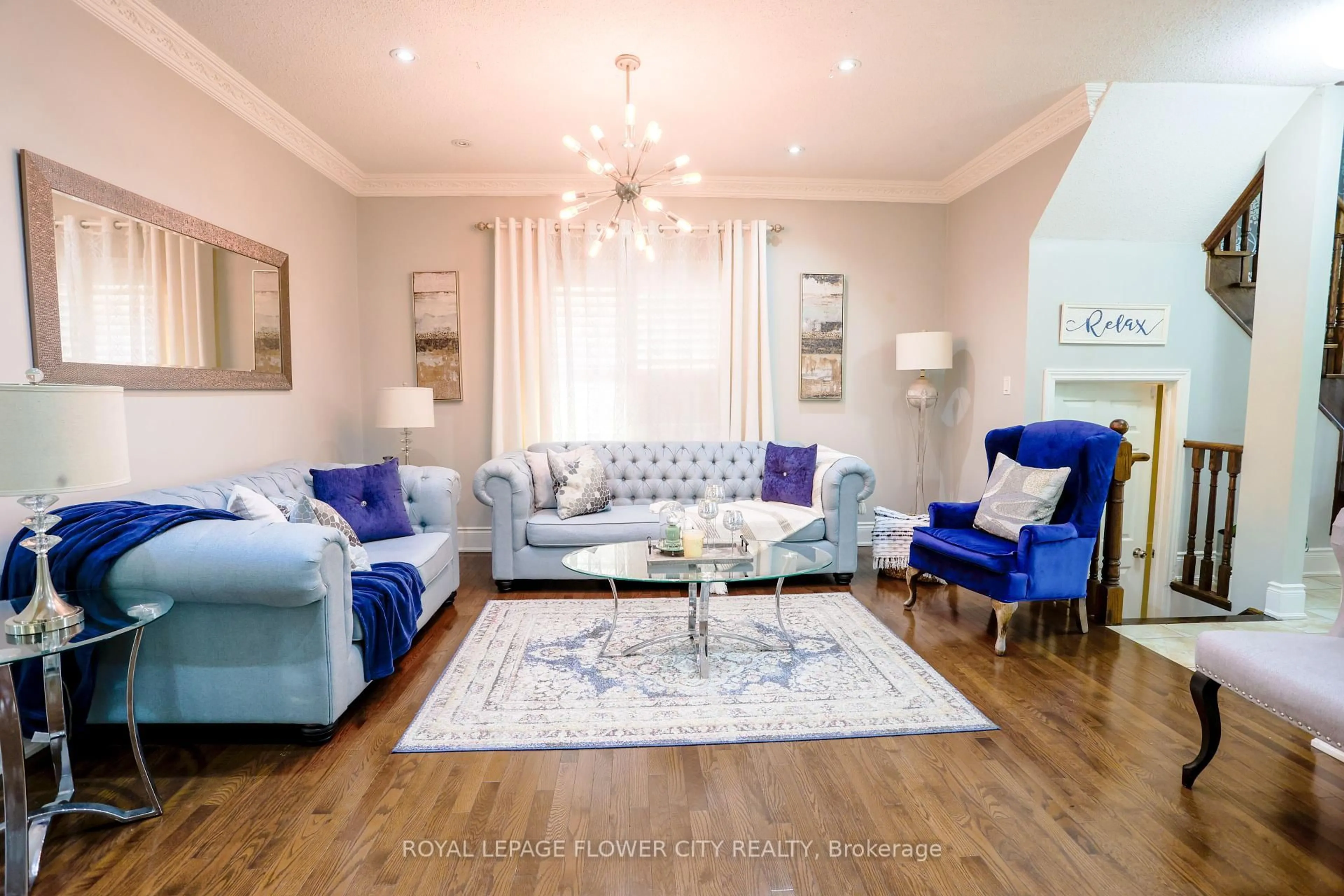 Living room with furniture, wood/laminate floor for 19 Teal Crest Circ, Brampton Ontario L6X 2Z6