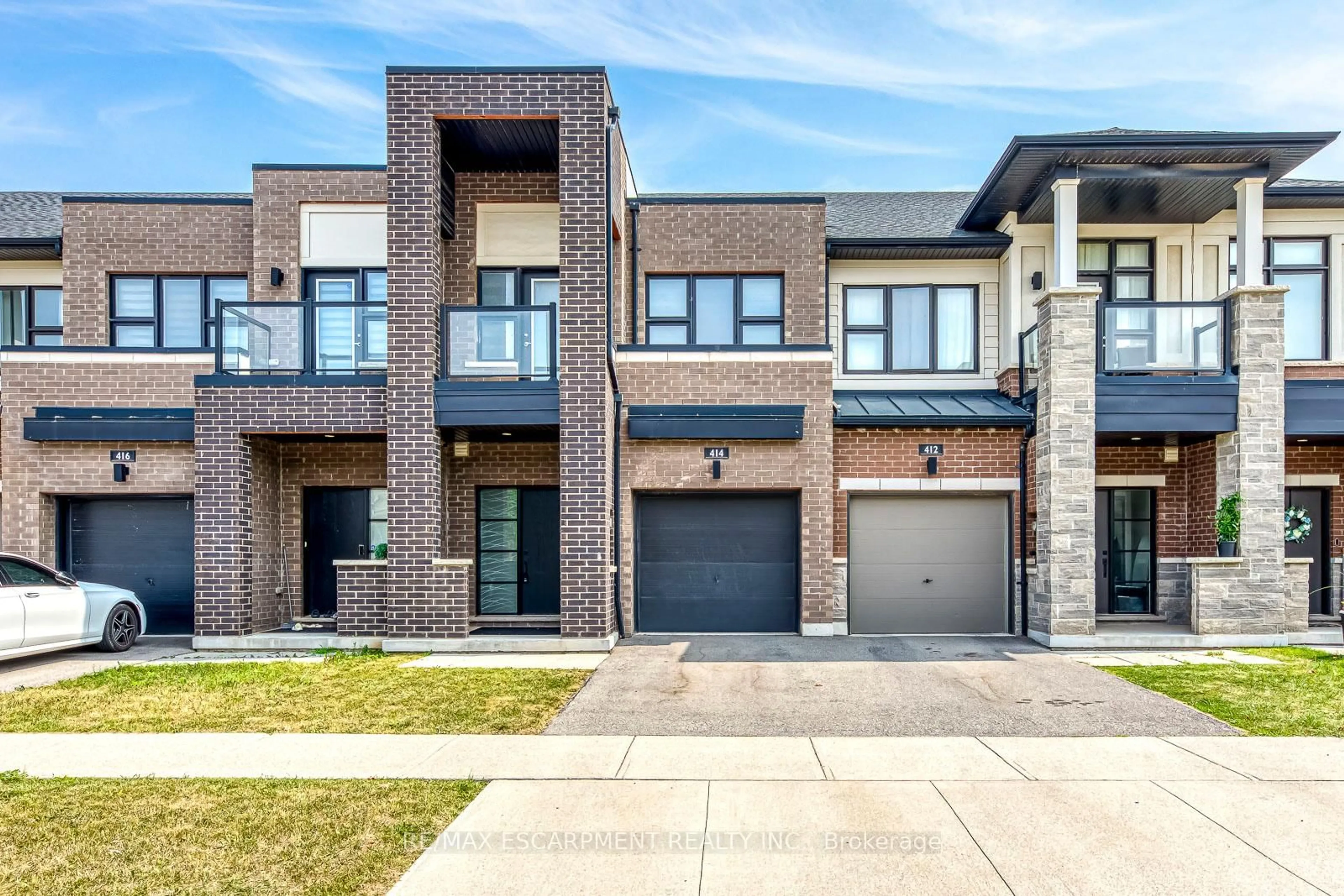 Home with brick exterior material, street for 414 Wheat Boom Dr, Oakville Ontario L6H 0R4