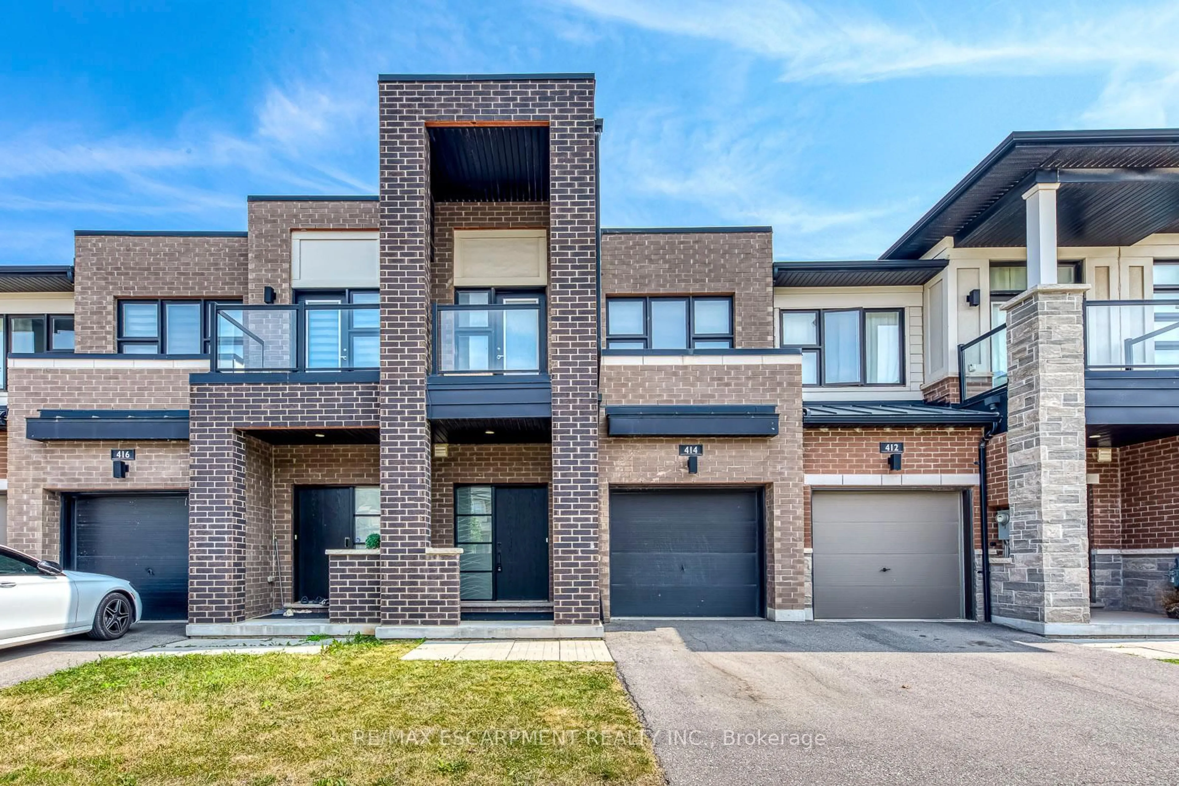 Home with brick exterior material, street for 414 Wheat Boom Dr, Oakville Ontario L6H 0R4