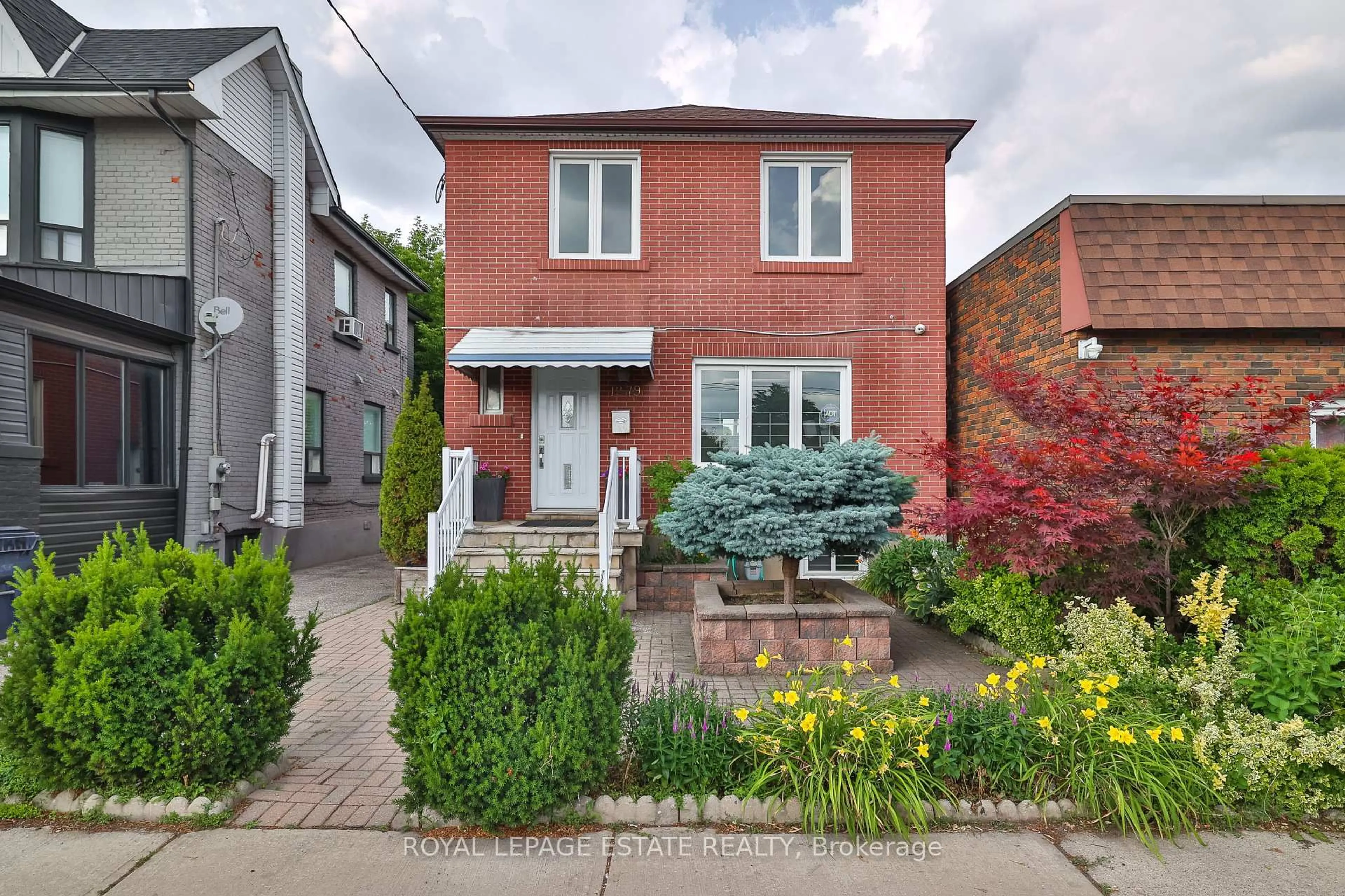Home with brick exterior material, street for 1279 Weston Rd, Toronto Ontario M6M 4R2
