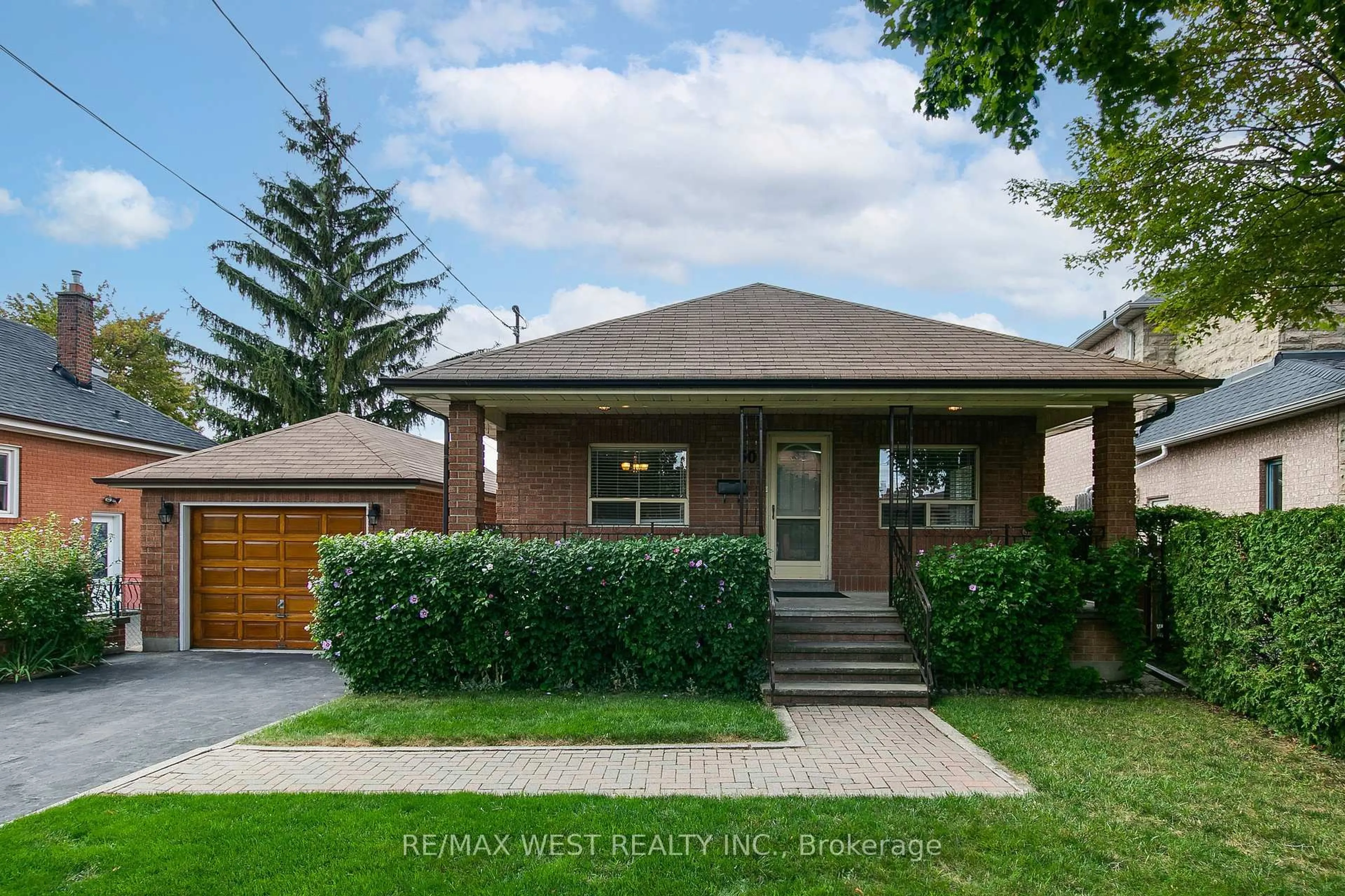 Home with brick exterior material, street for 50 Larchmere Ave, Toronto Ontario M9L 2N3