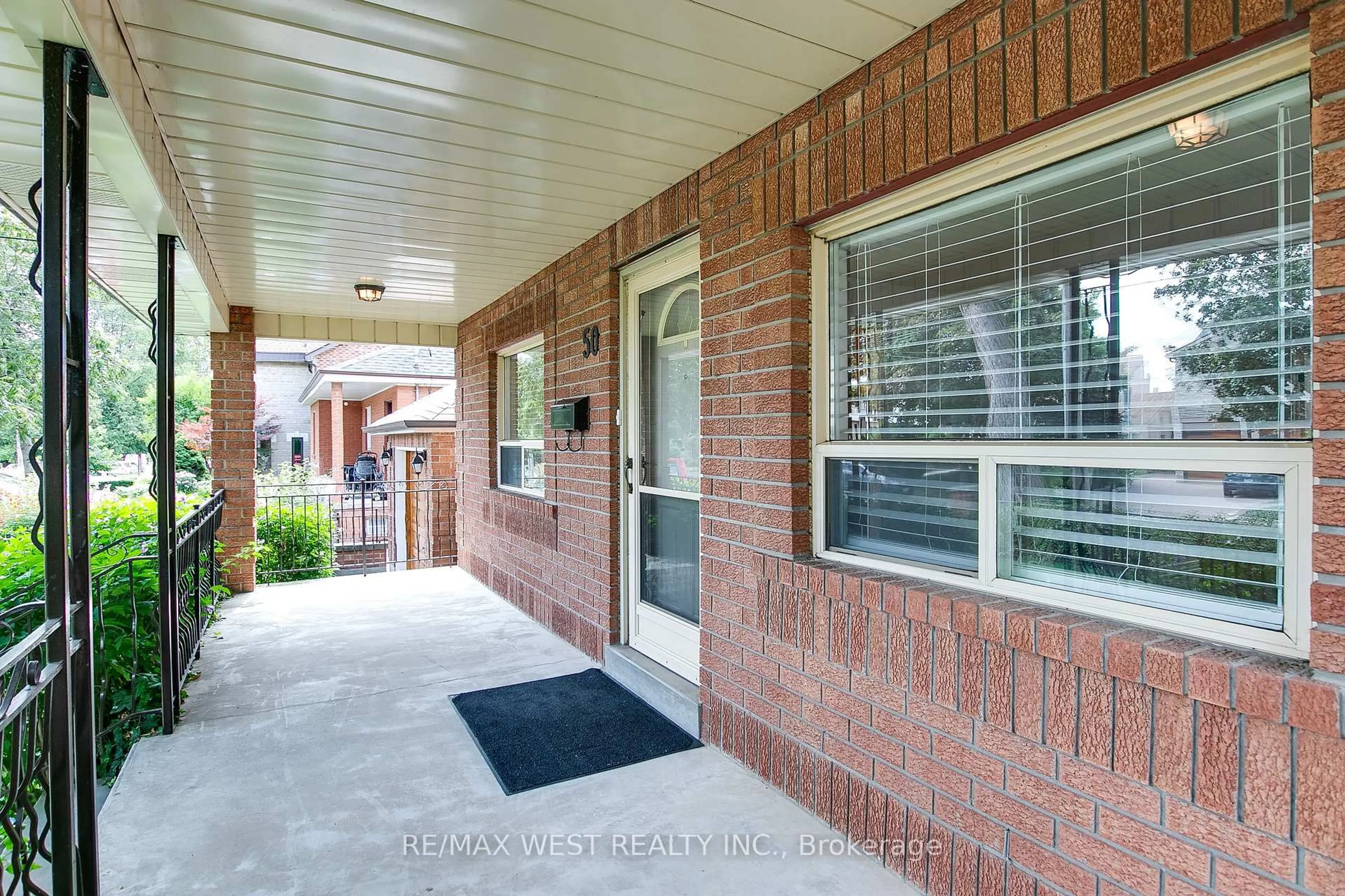 Home with brick exterior material, street for 50 Larchmere Ave, Toronto Ontario M9L 2N3