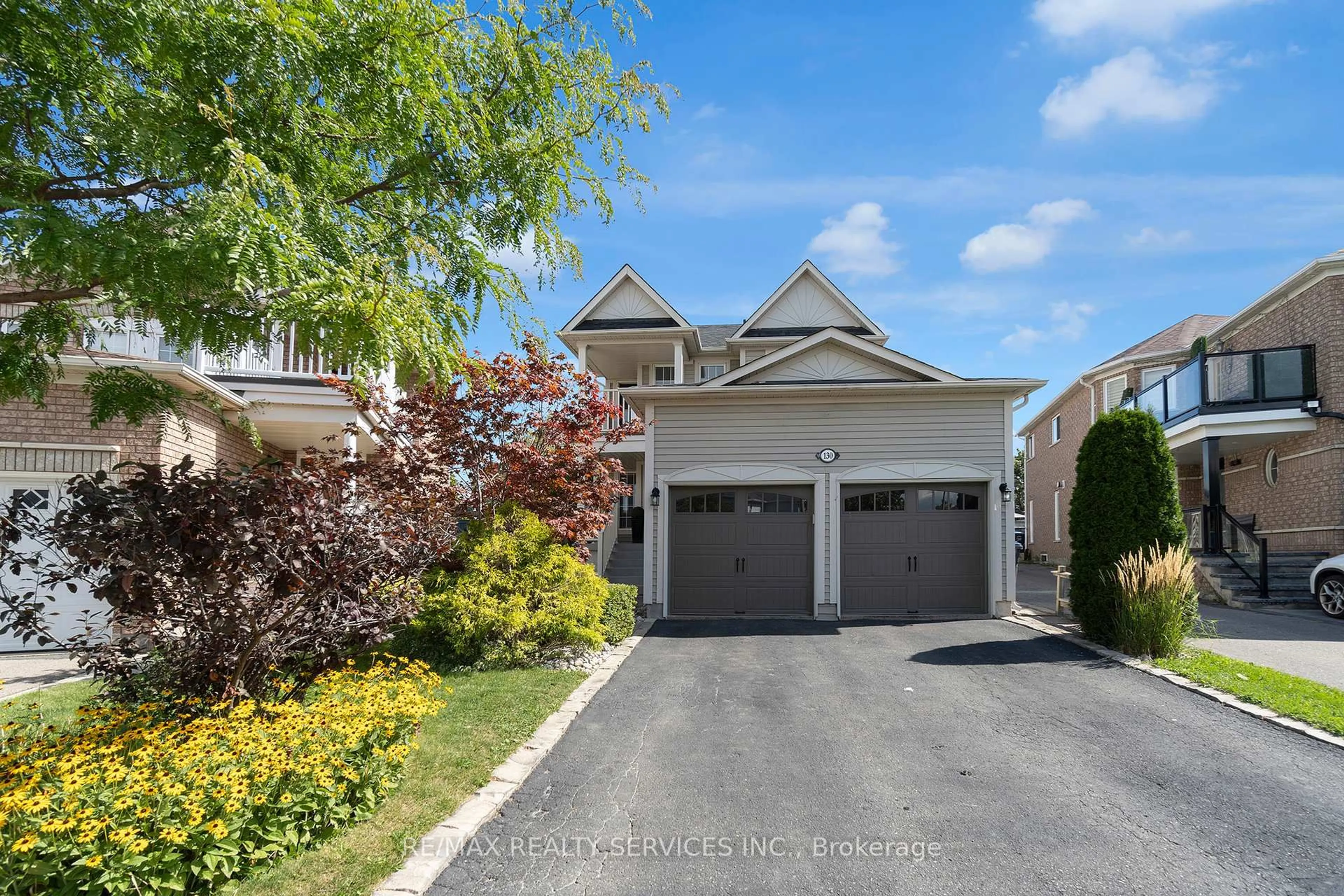 A pic from outside/outdoor area/front of a property/back of a property/a pic from drone, street for 130 Porchlight Rd, Brampton Ontario L6X 4R8