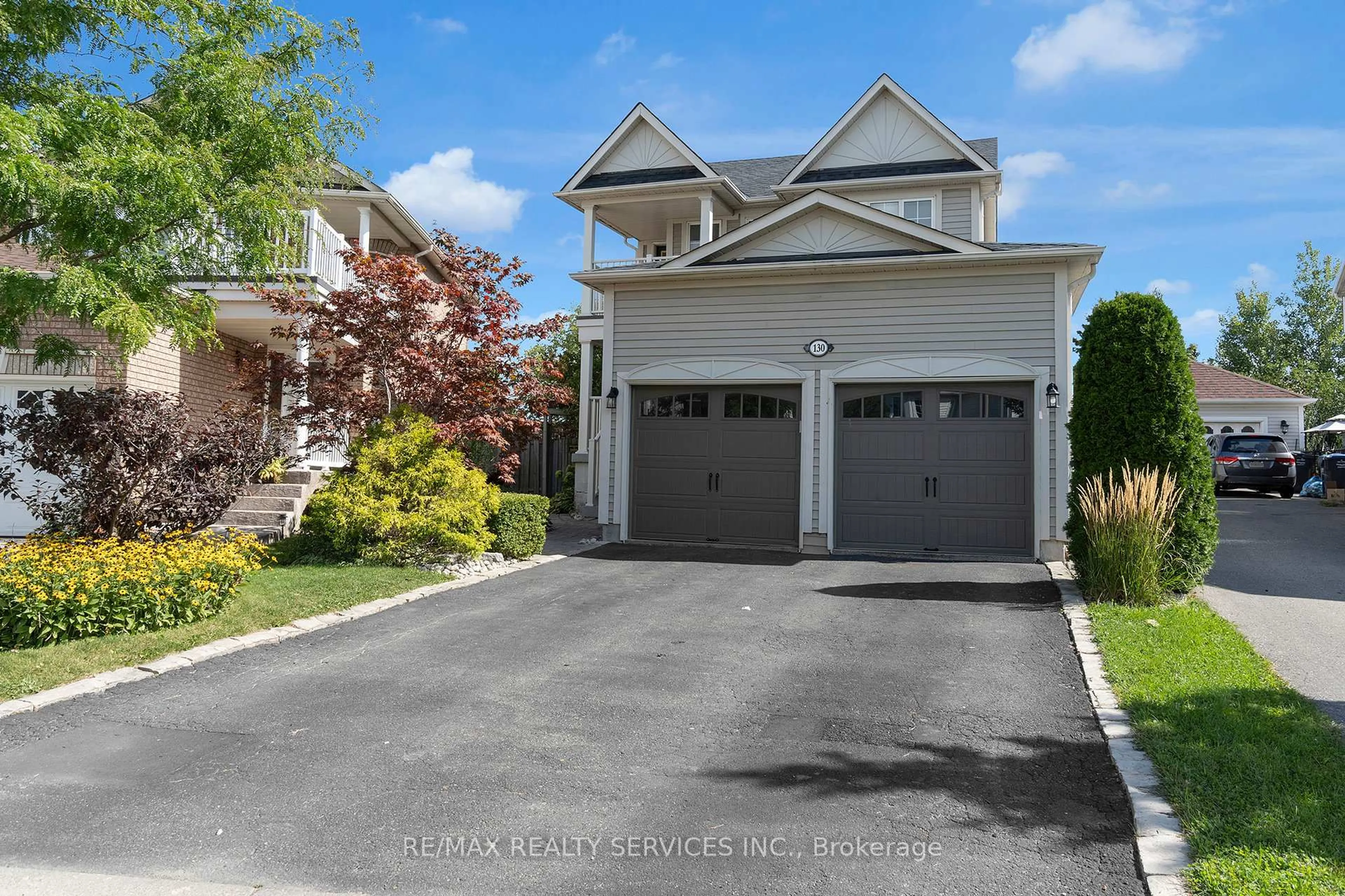 Home with vinyl exterior material, street for 130 Porchlight Rd, Brampton Ontario L6X 4R8