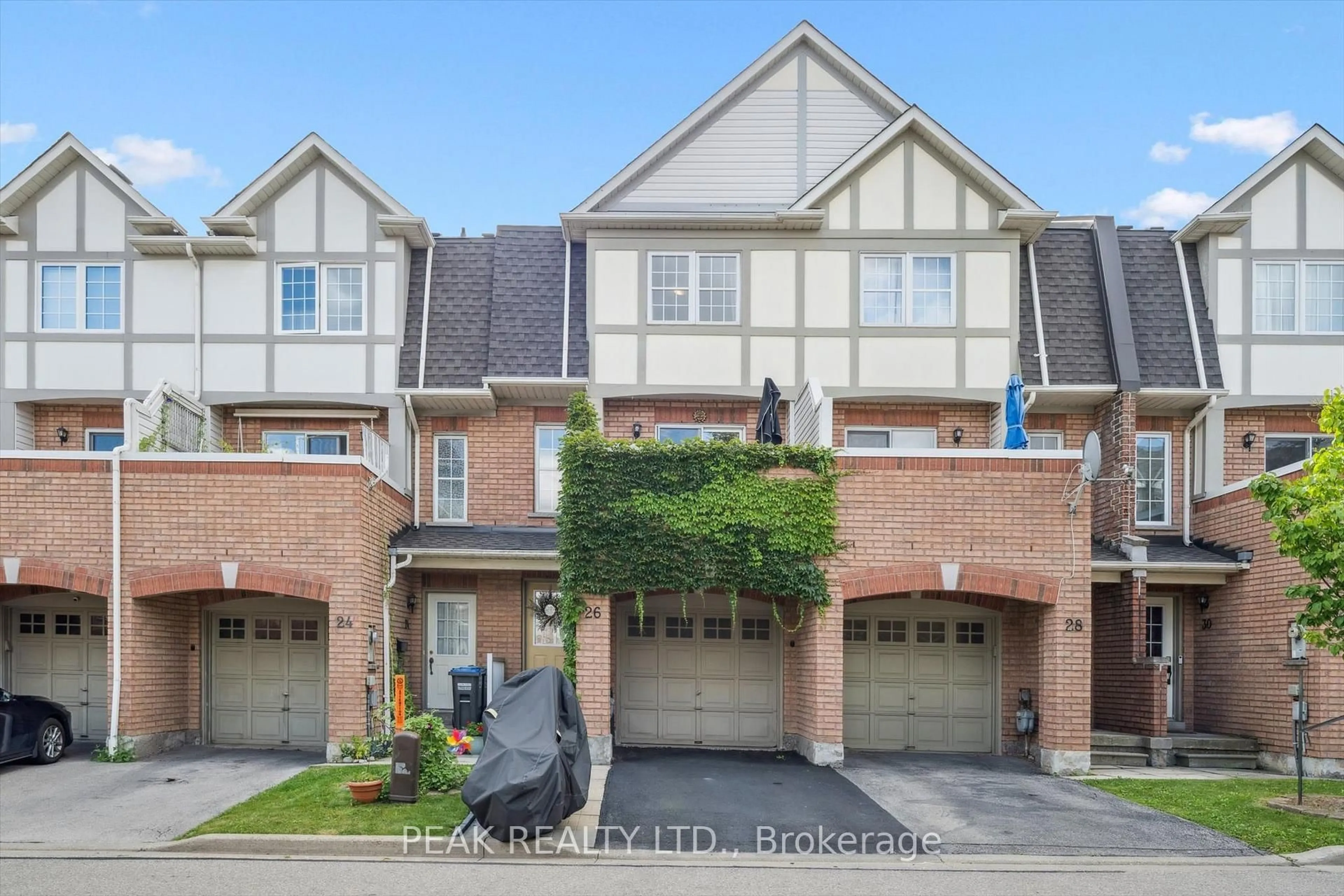 Home with brick exterior material, street for 3030 Breakwater Crt #26, Mississauga Ontario L5B 4N8