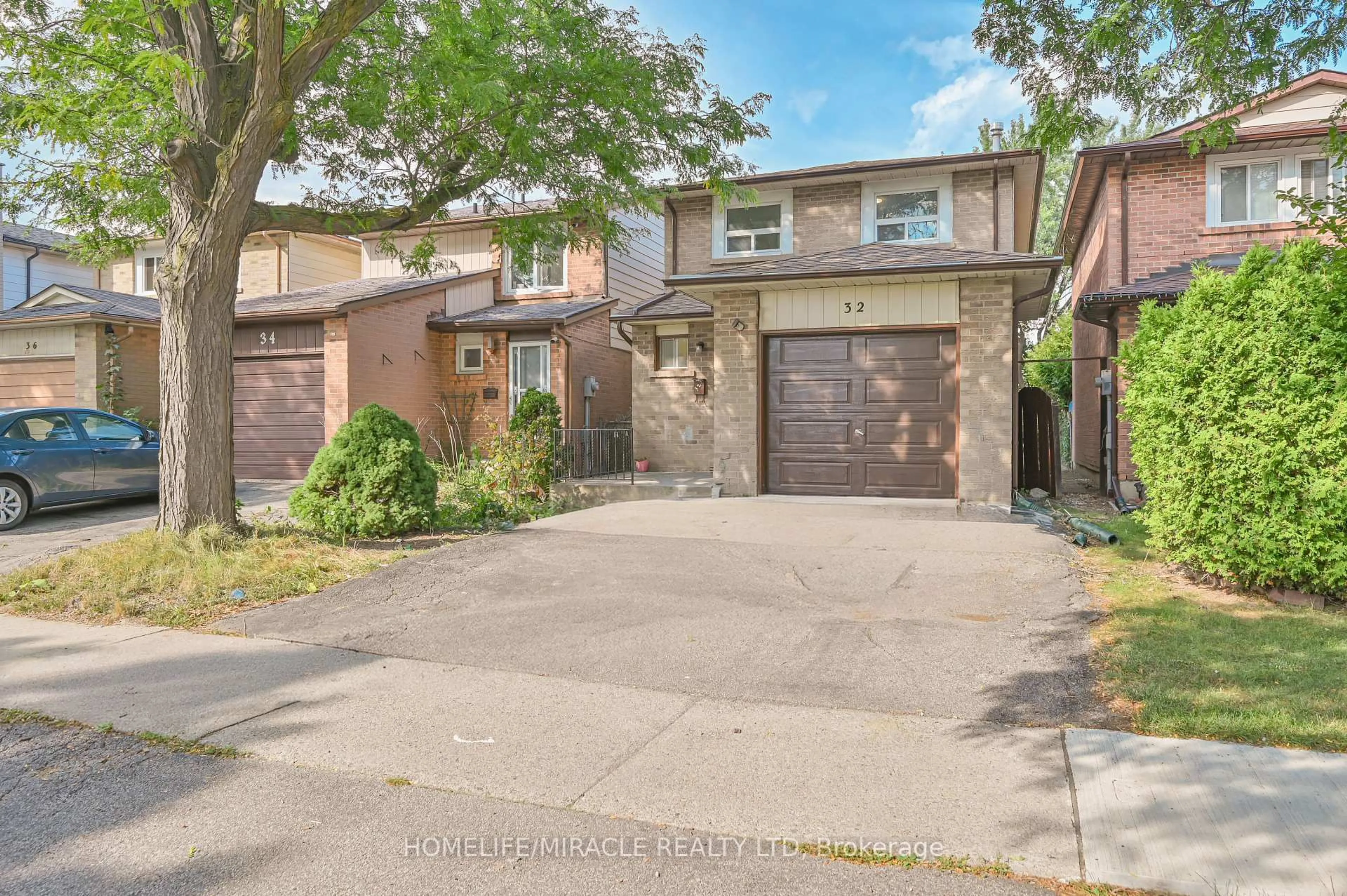 Home with brick exterior material, street for 32 Woodsview Ave, Toronto Ontario M9W 6C1