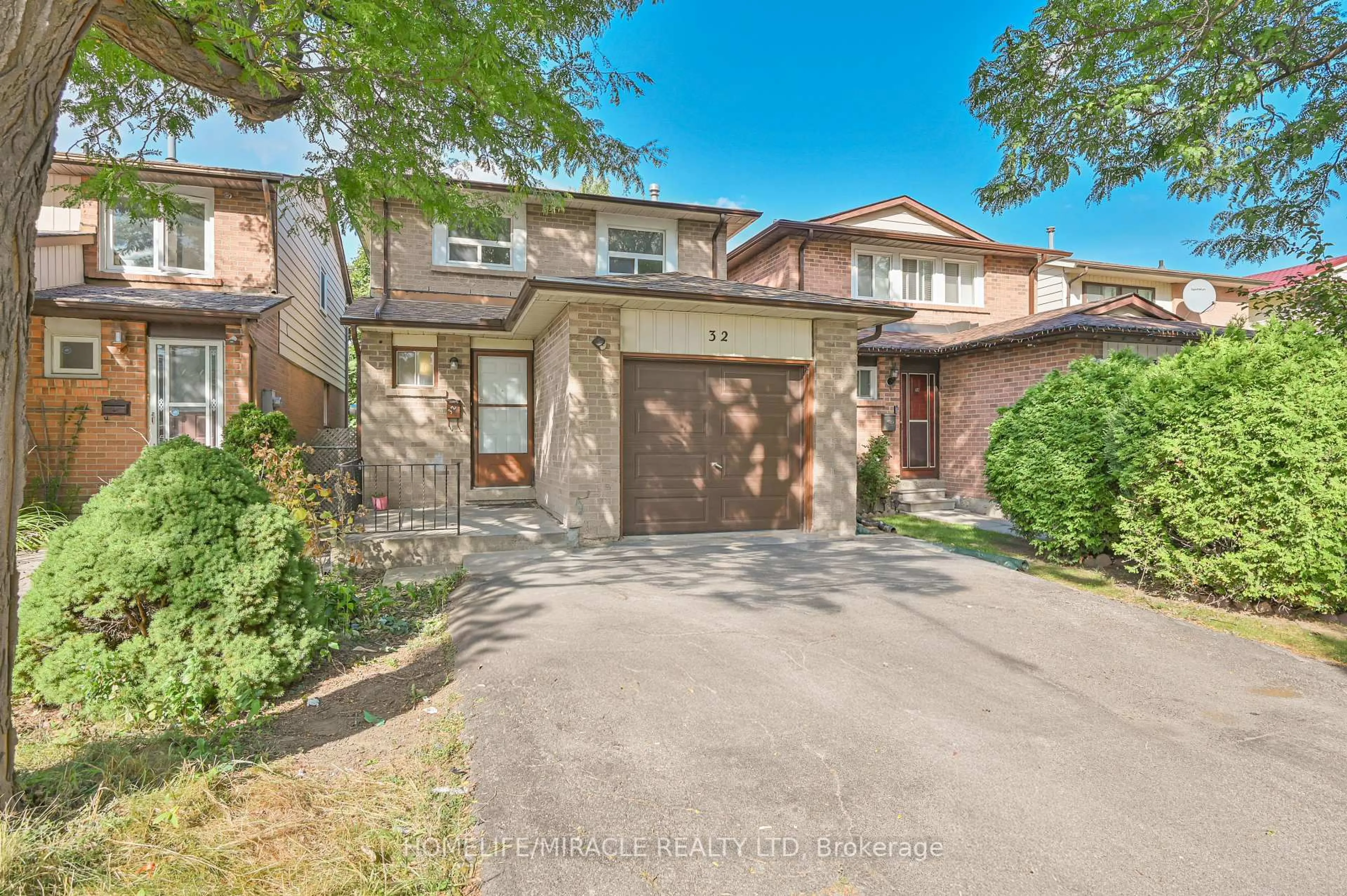 Home with brick exterior material, street for 32 Woodsview Ave, Toronto Ontario M9W 6C1