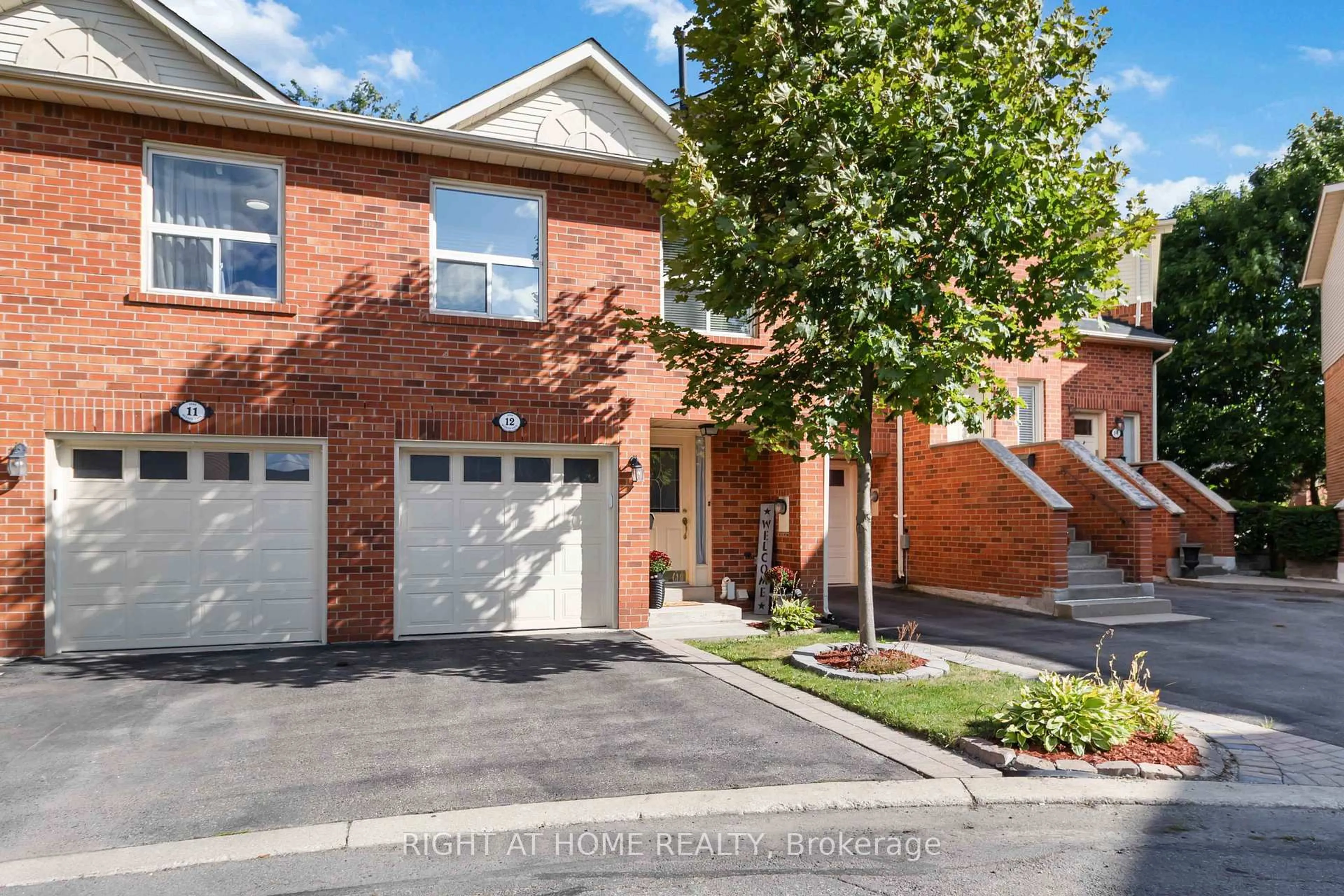 Home with brick exterior material, street for 1520 Reeves Gate #12, Oakville Ontario L6M 3J4