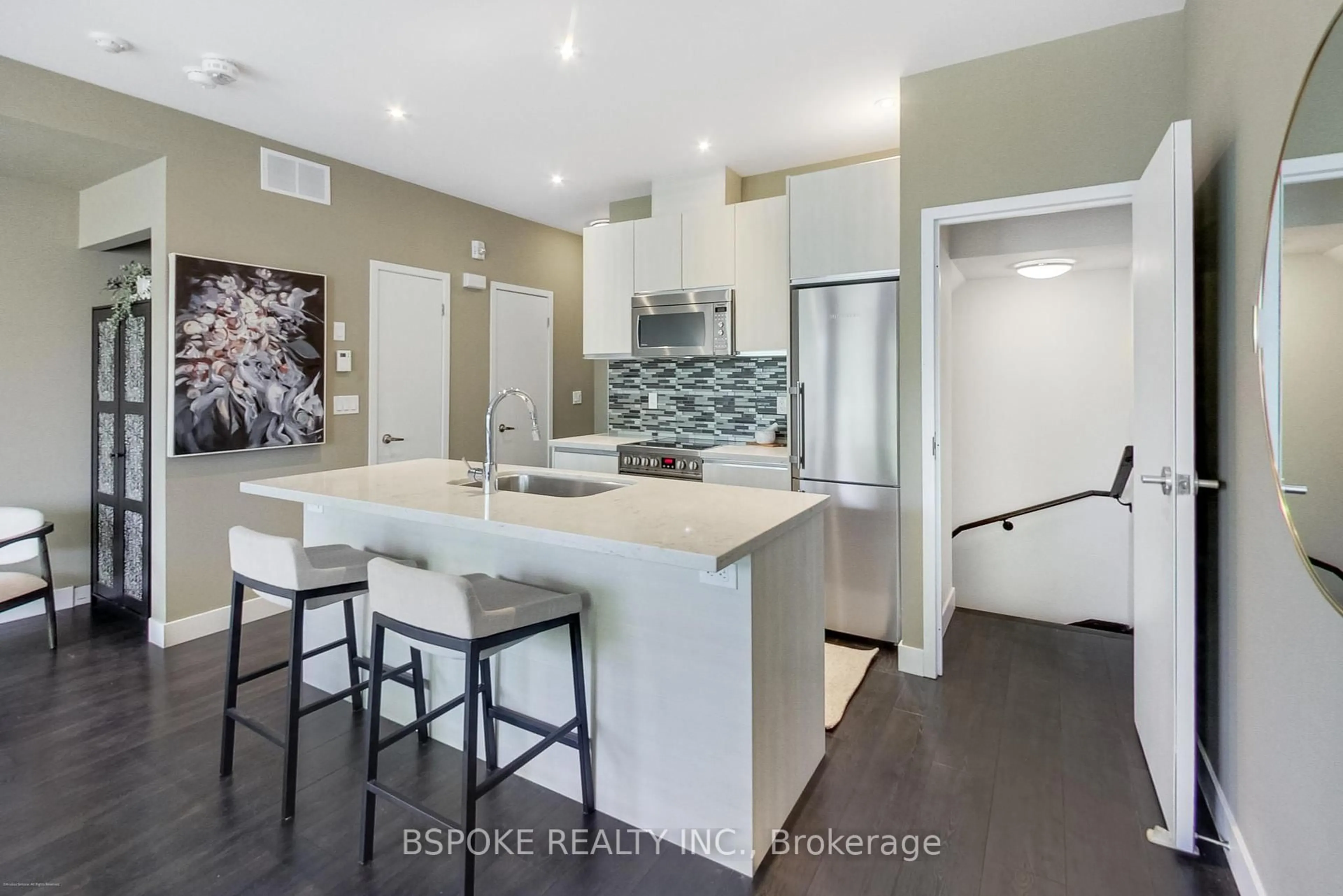 Open concept kitchen, ceramic/tile floor for 441 Jane St #210, Toronto Ontario M6S 3Z9