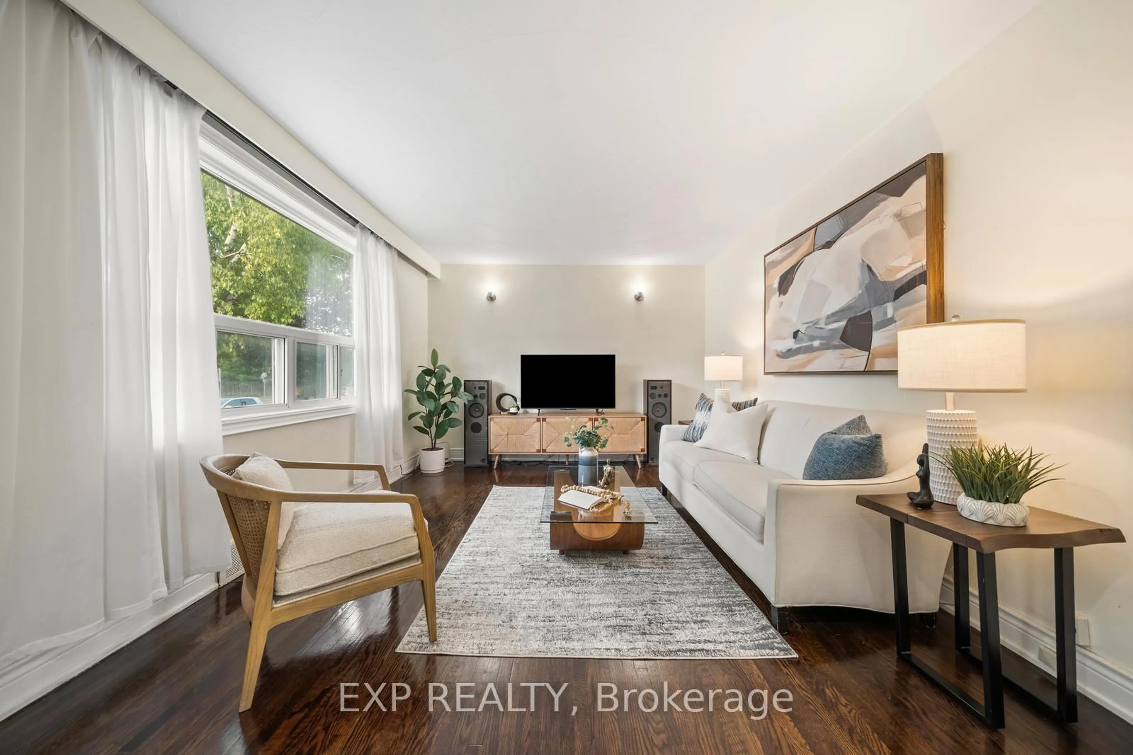 Living room with furniture, wood/laminate floor for 55 Winston Park Blvd, Toronto Ontario M3K 1C2