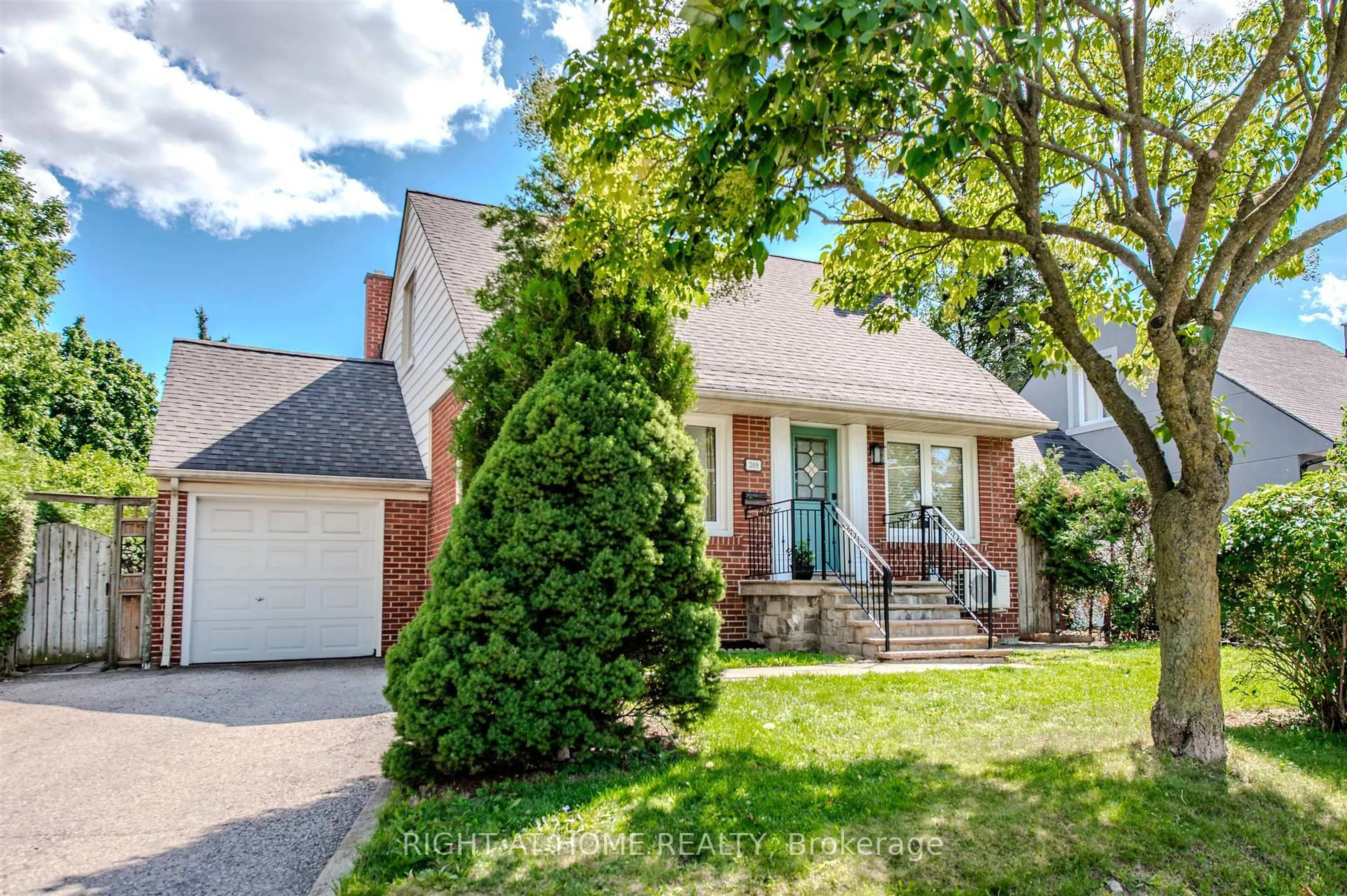Home with brick exterior material, street for 309 Rathburn Rd, Toronto Ontario M9B 2L7