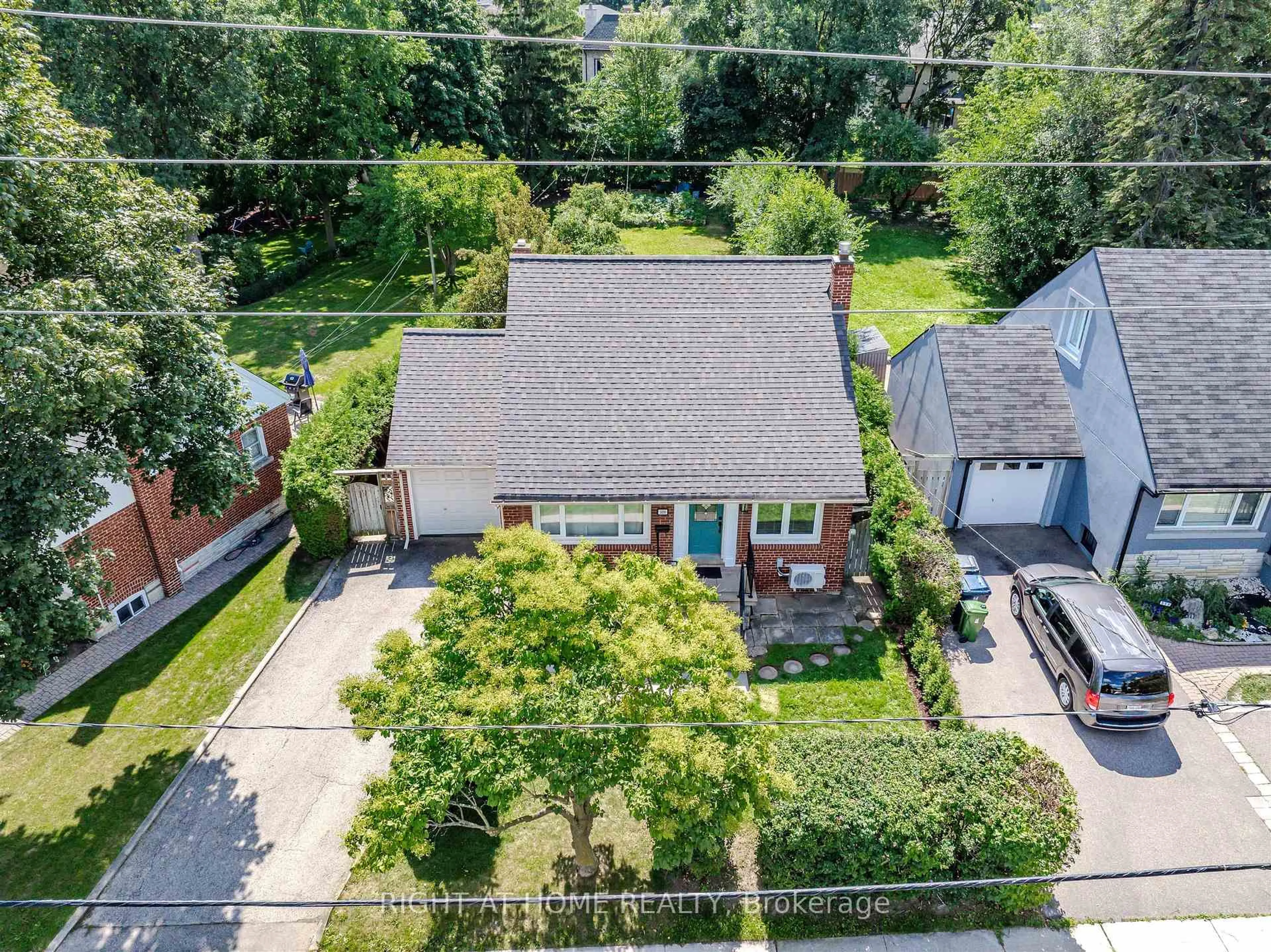 A pic from outside/outdoor area/front of a property/back of a property/a pic from drone, street for 309 Rathburn Rd, Toronto Ontario M9B 2L7