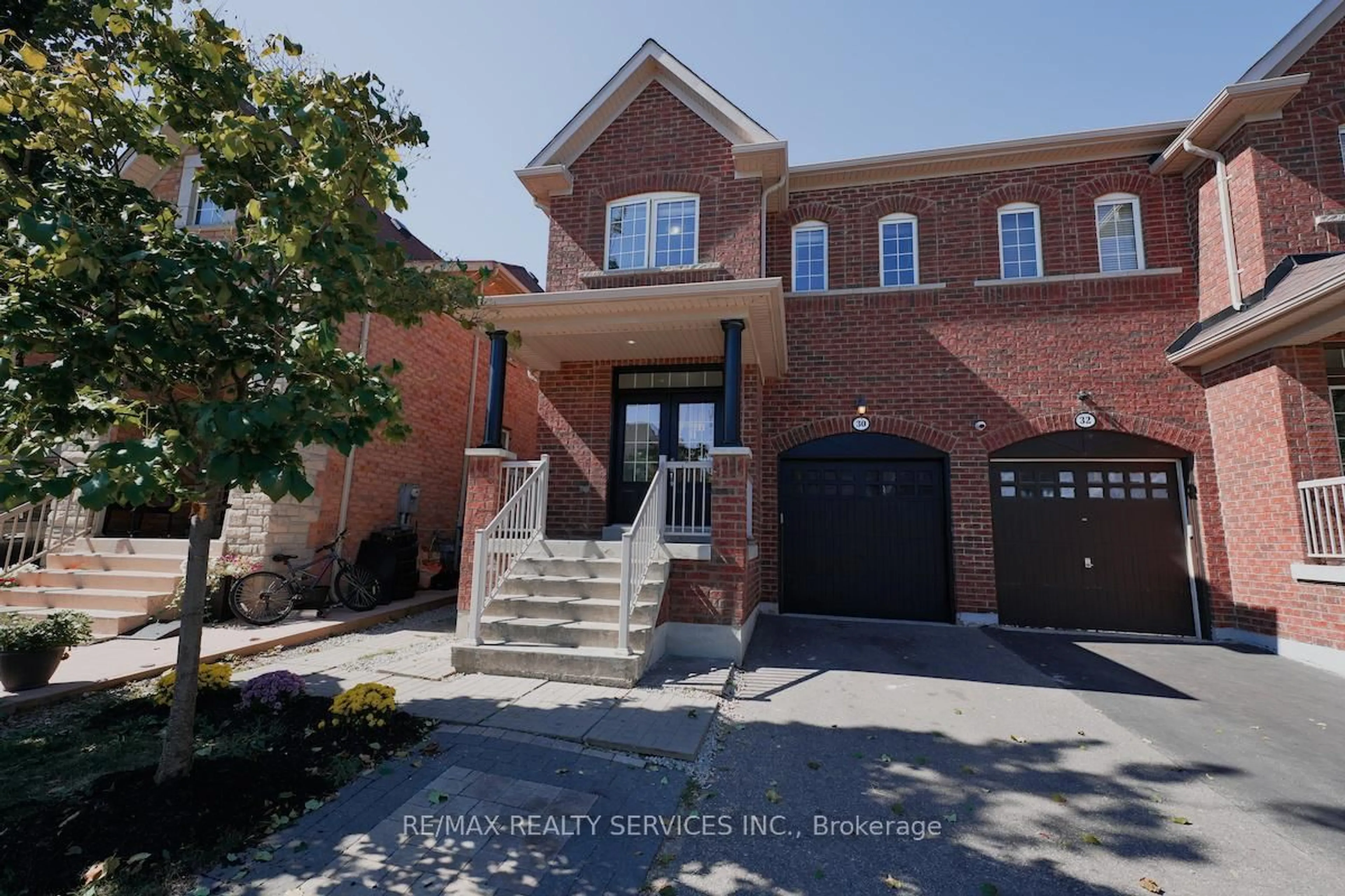 Home with brick exterior material, street for 30 Loftsmoor Dr, Brampton Ontario L6R 3R7