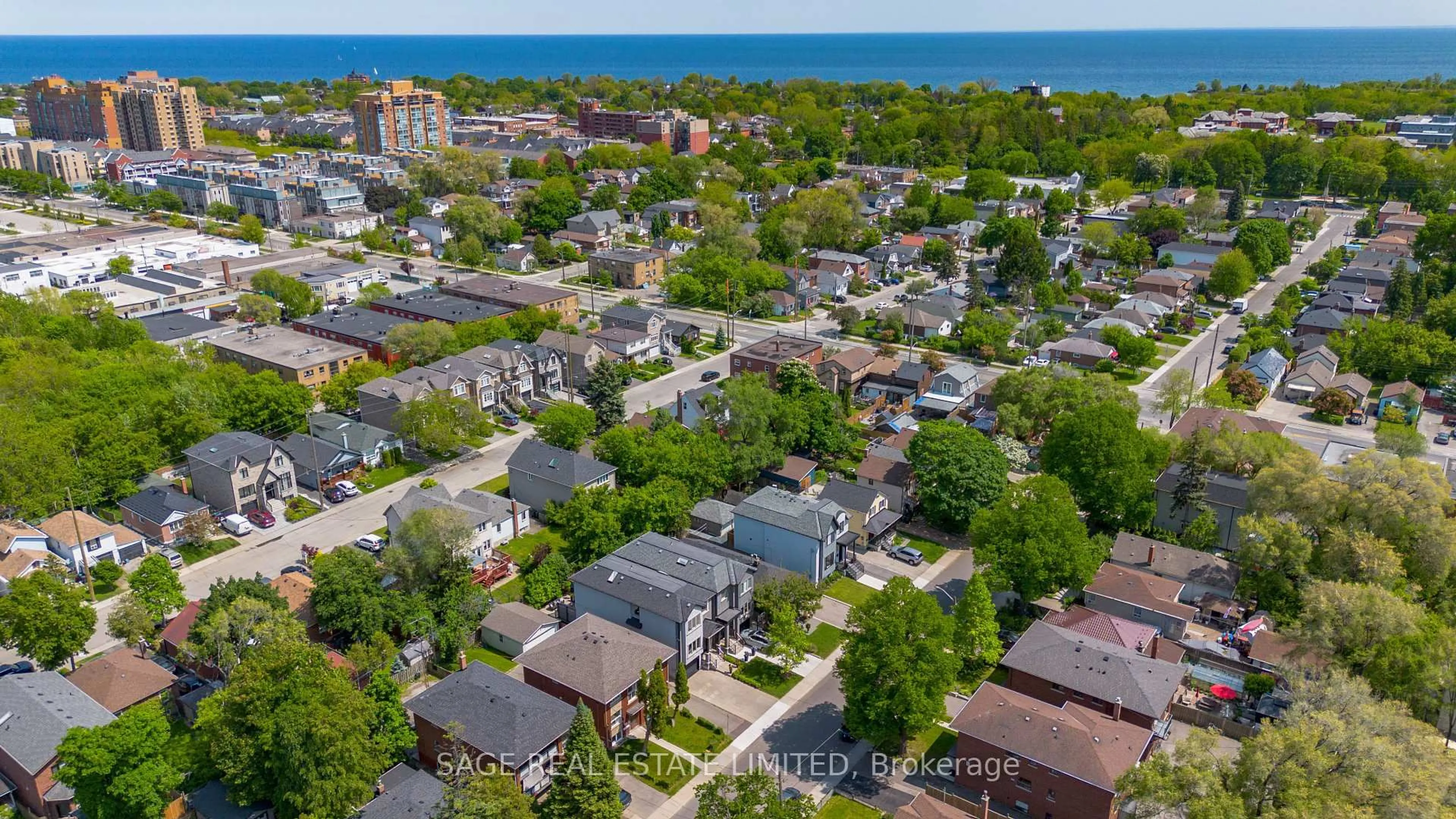 A pic from outside/outdoor area/front of a property/back of a property/a pic from drone, street for 81B Seventeenth St, Toronto Ontario M8V 3K5