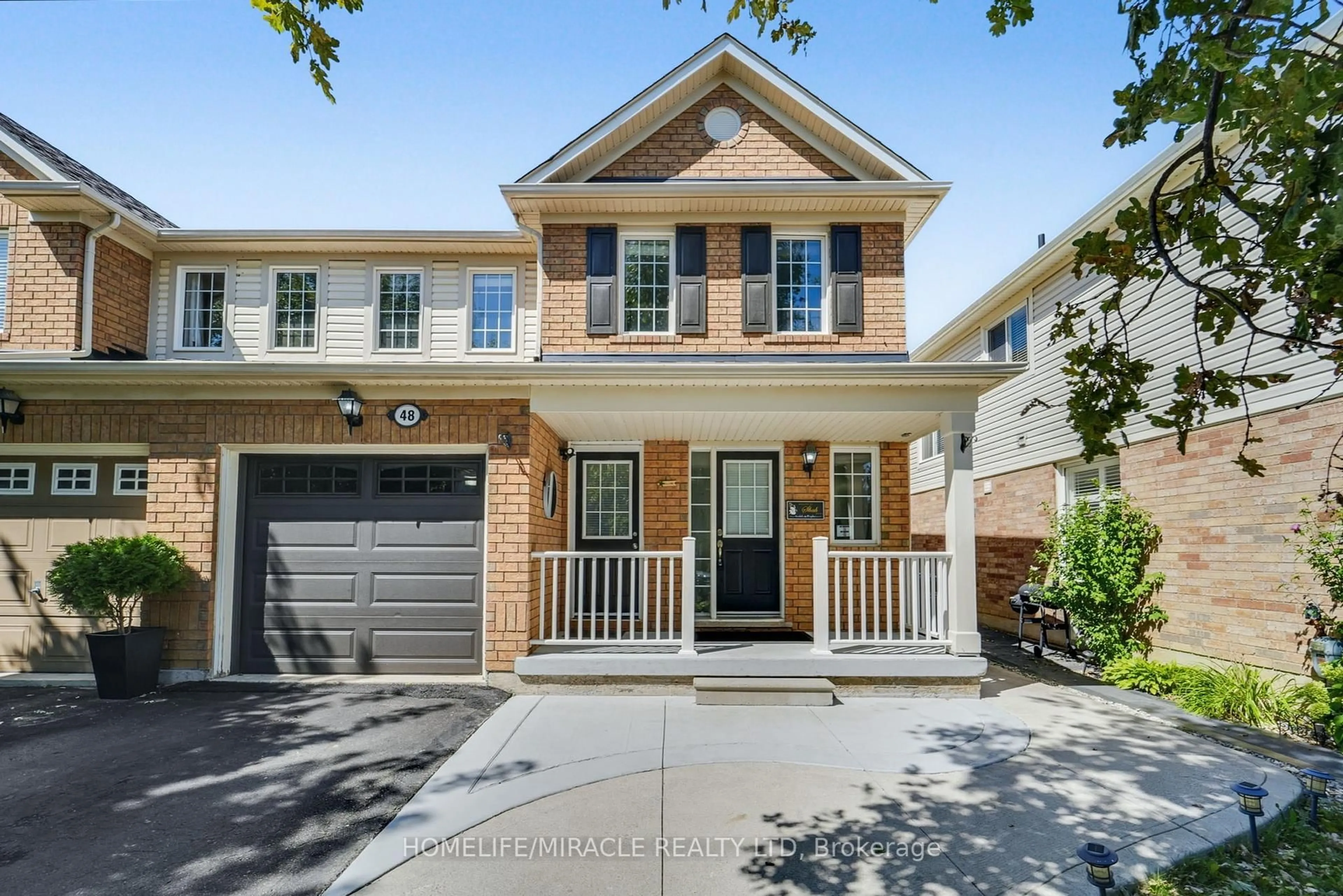 Home with brick exterior material, street for 48 Jessop Dr, Brampton Ontario L7A 3M8