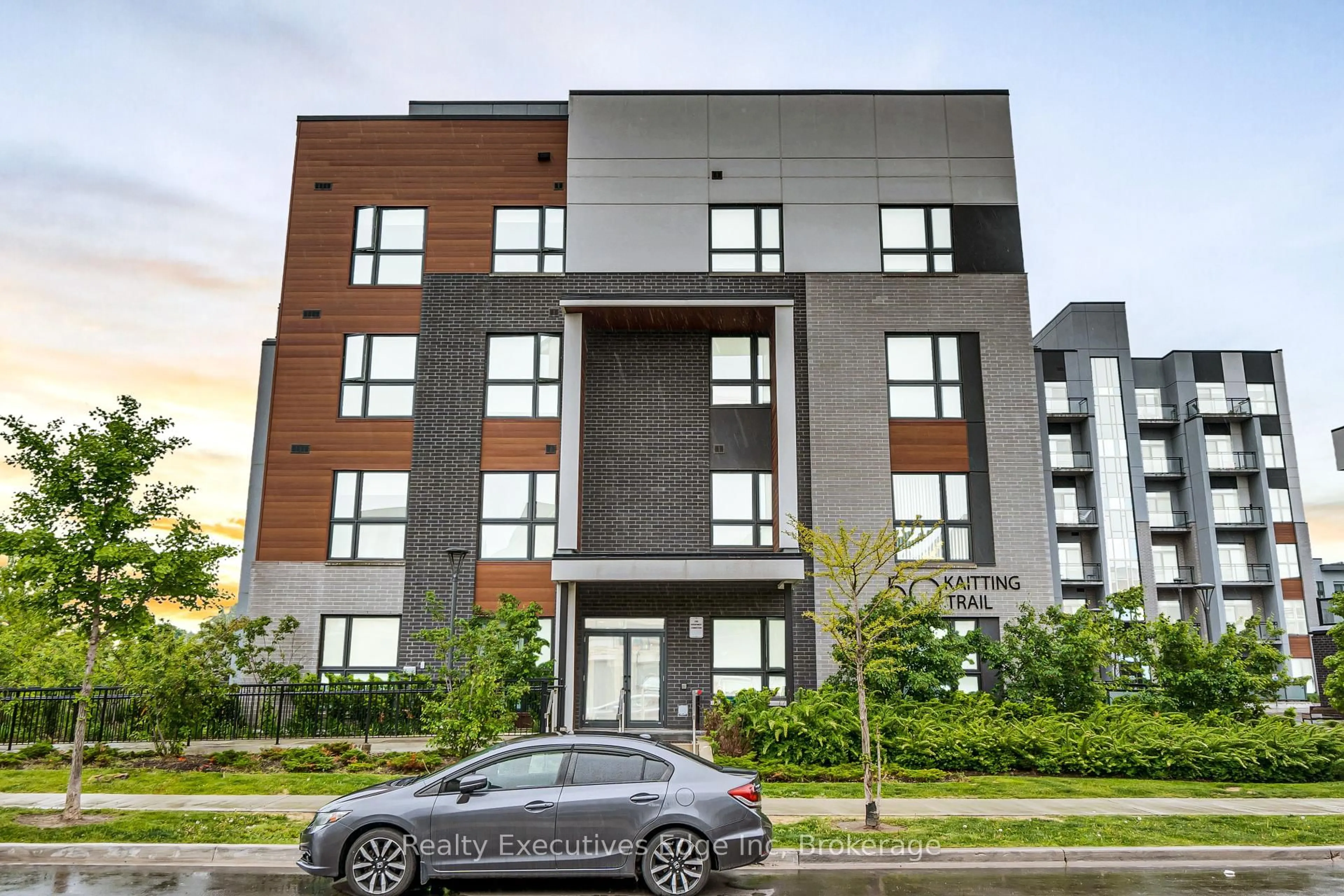 Home with brick exterior material, building for 50 Kaitting Tr #304, Oakville Ontario L6M 5N3