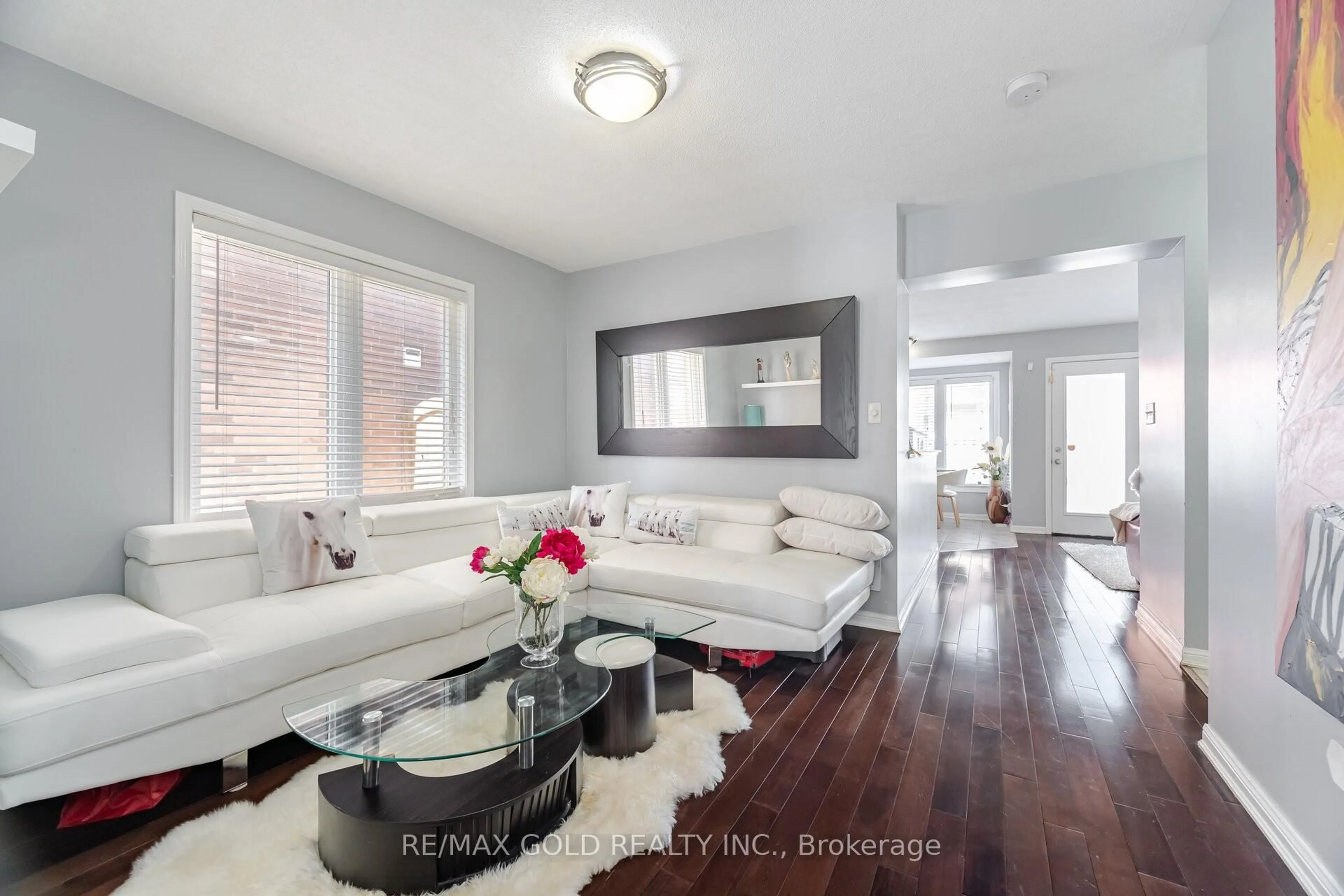 Living room with furniture, unknown for 8 Caliper Dr, Brampton Ontario L6P 3P8
