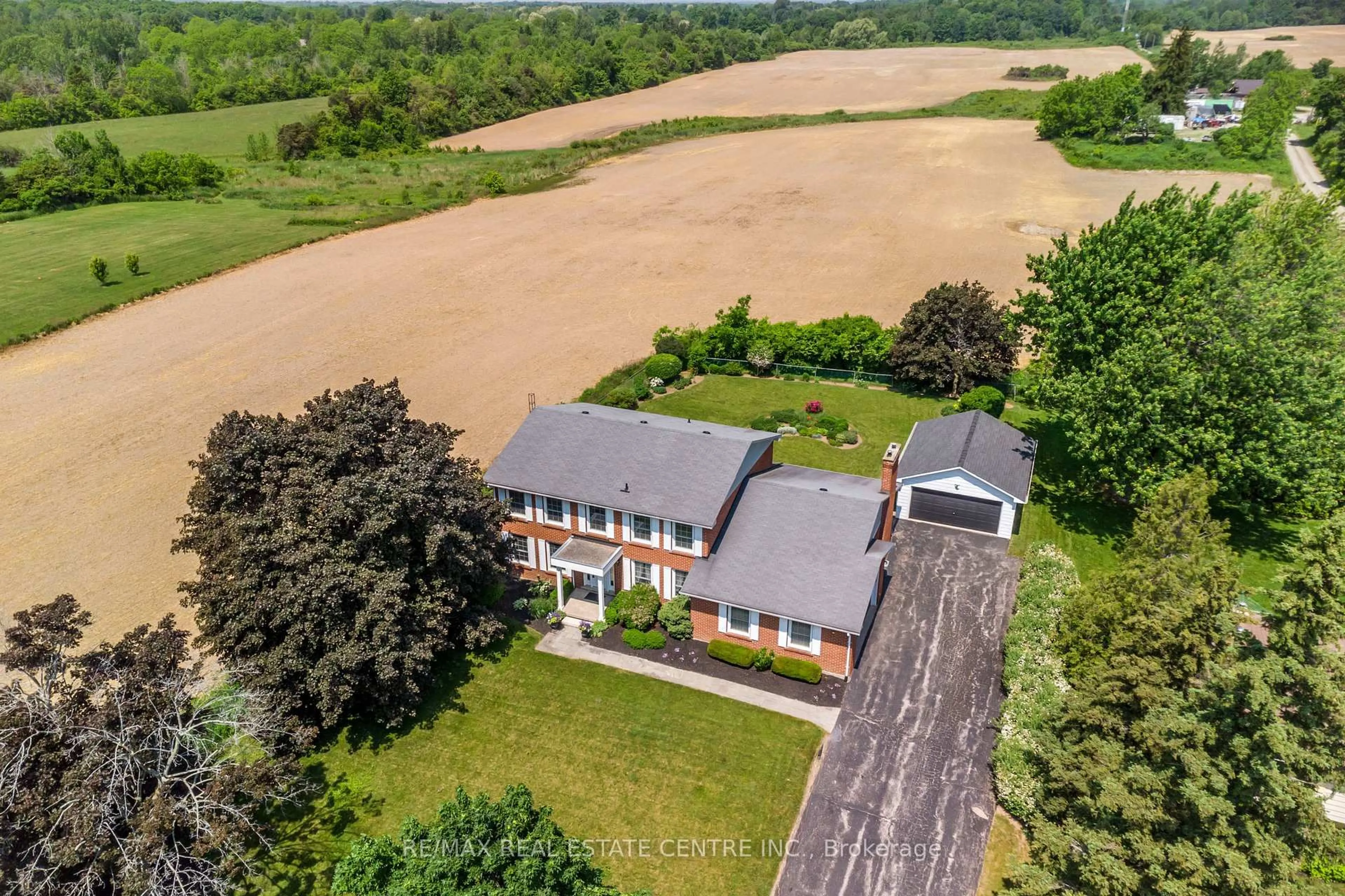 A pic from outside/outdoor area/front of a property/back of a property/a pic from drone, water/lake/river/ocean view for 2151 1 Rd, Burlington Ontario L7P 0S3