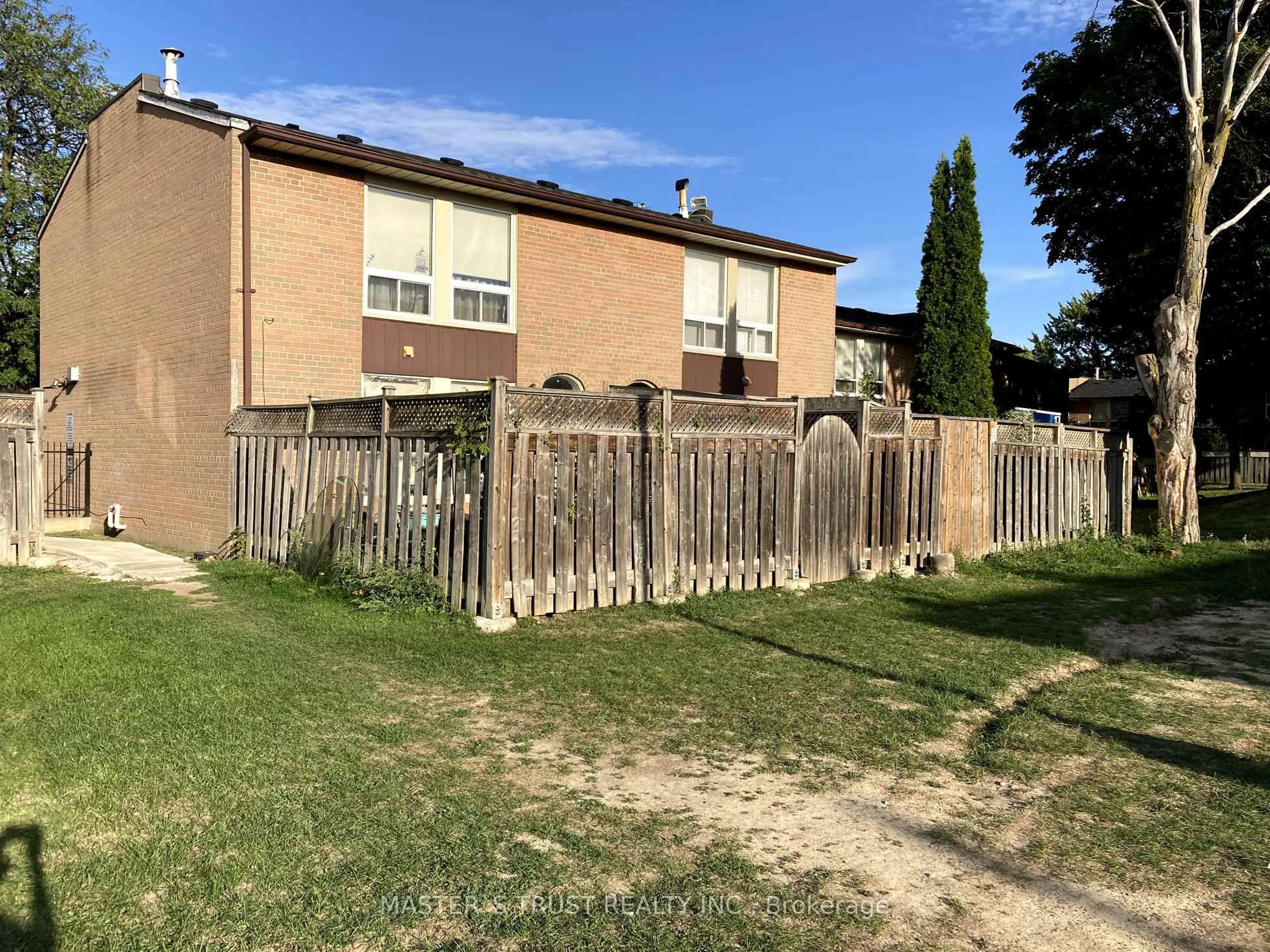 A pic from outside/outdoor area/front of a property/back of a property/a pic from drone, street for 246 John Garland Blvd #72, Toronto Ontario M9V 1N8