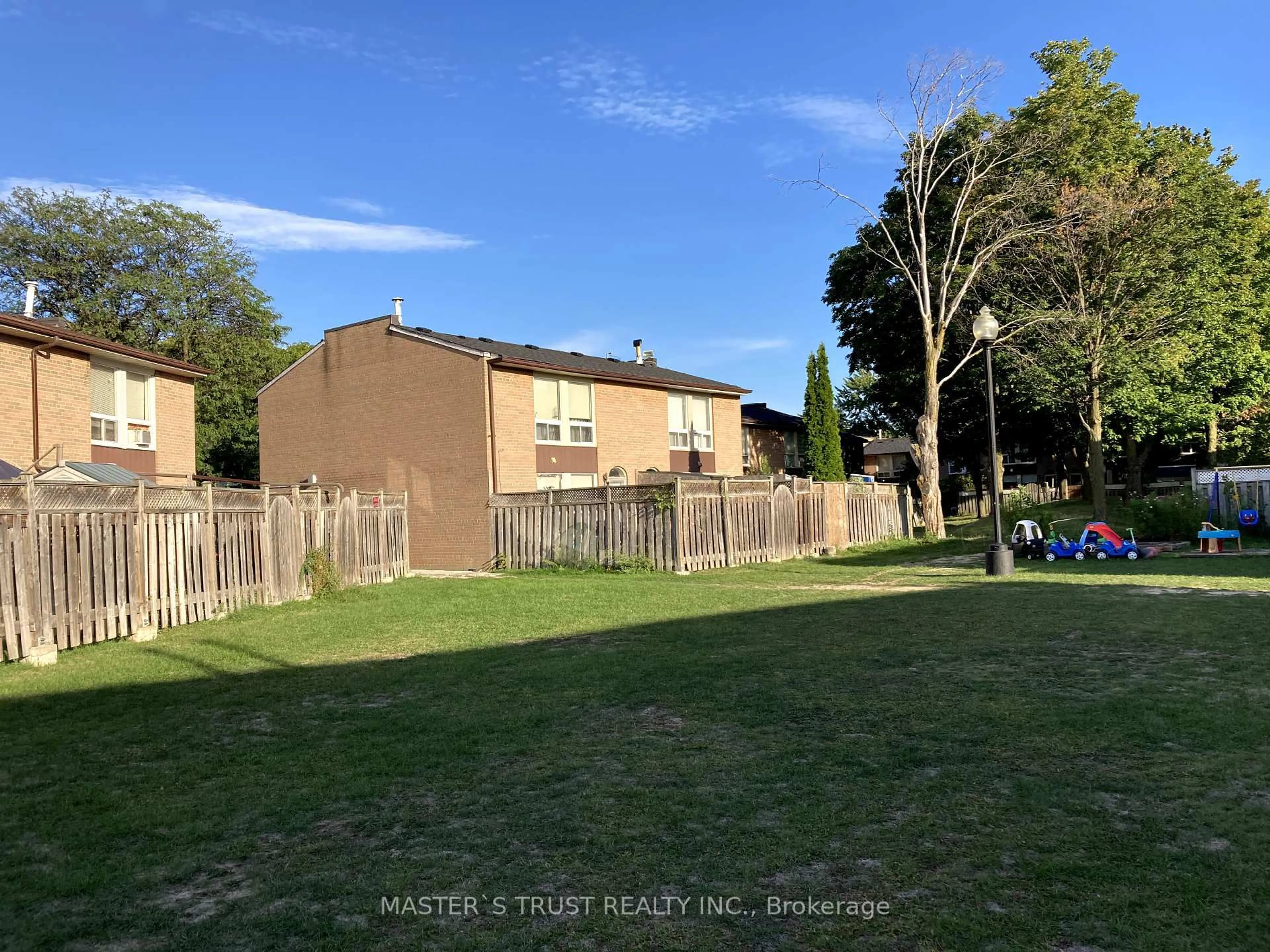 A pic from outside/outdoor area/front of a property/back of a property/a pic from drone, street for 246 John Garland Blvd #72, Toronto Ontario M9V 1N8