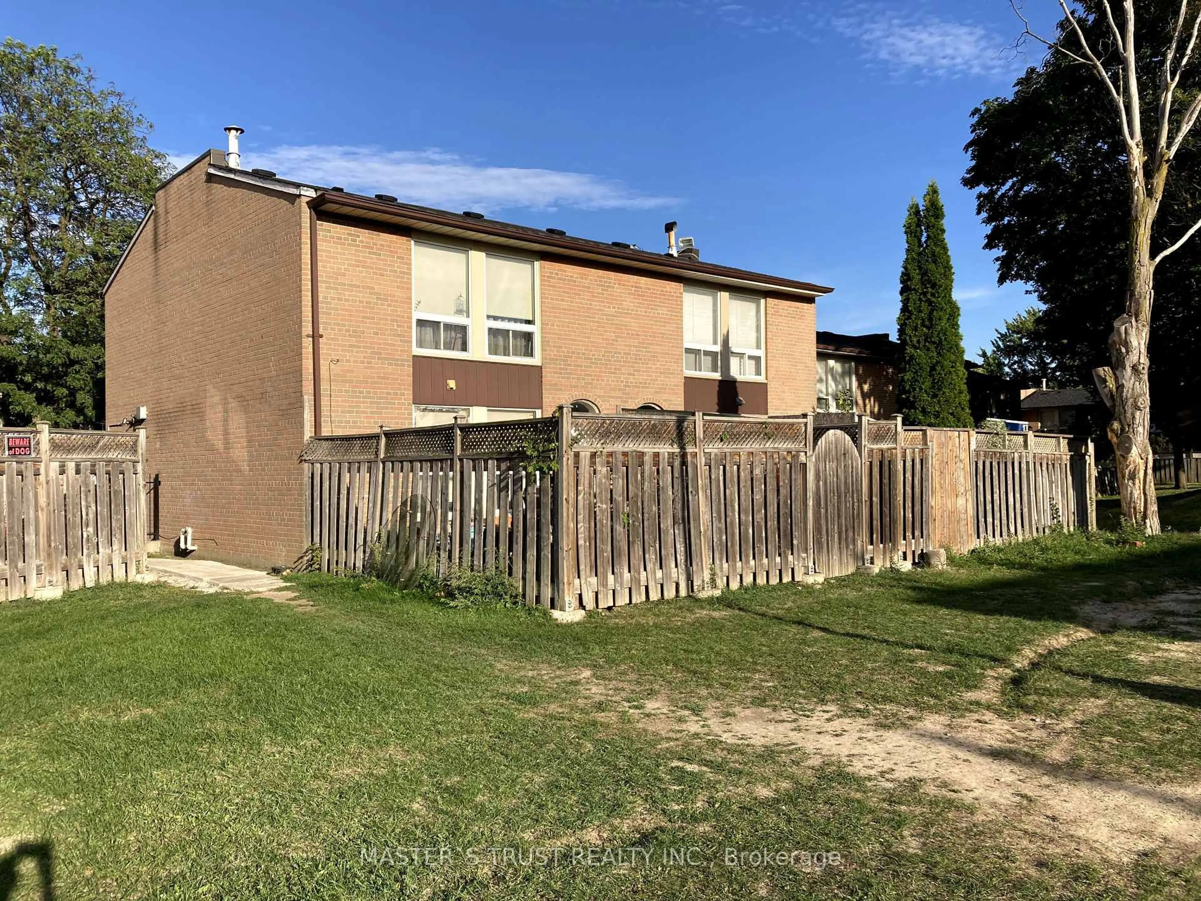A pic from outside/outdoor area/front of a property/back of a property/a pic from drone, street for 246 John Garland Blvd #72, Toronto Ontario M9V 1N8