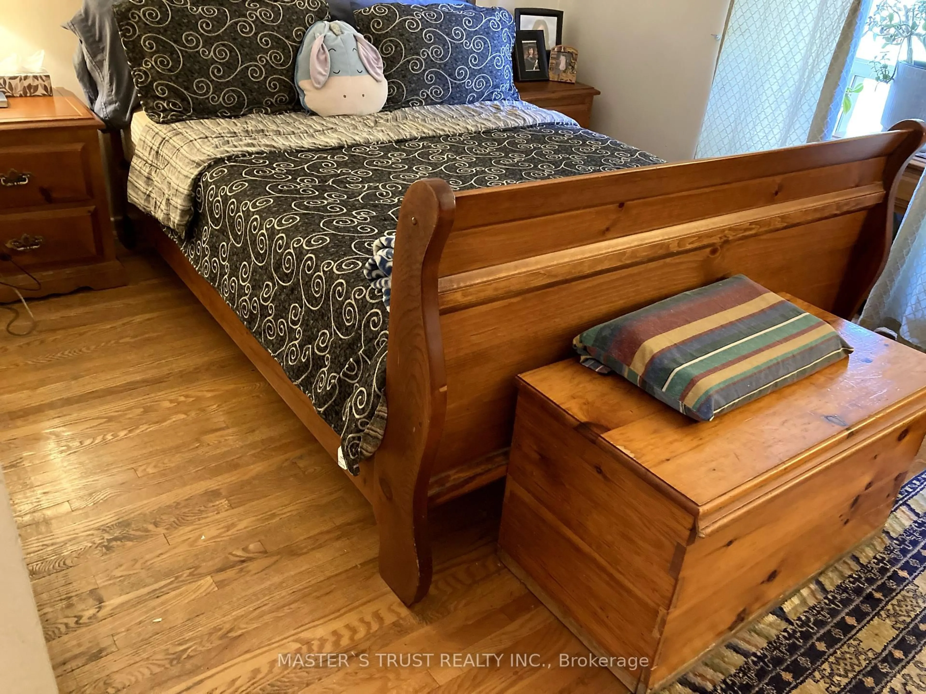 Bedroom with bed, wood/laminate floor for 246 John Garland Blvd #72, Toronto Ontario M9V 1N8