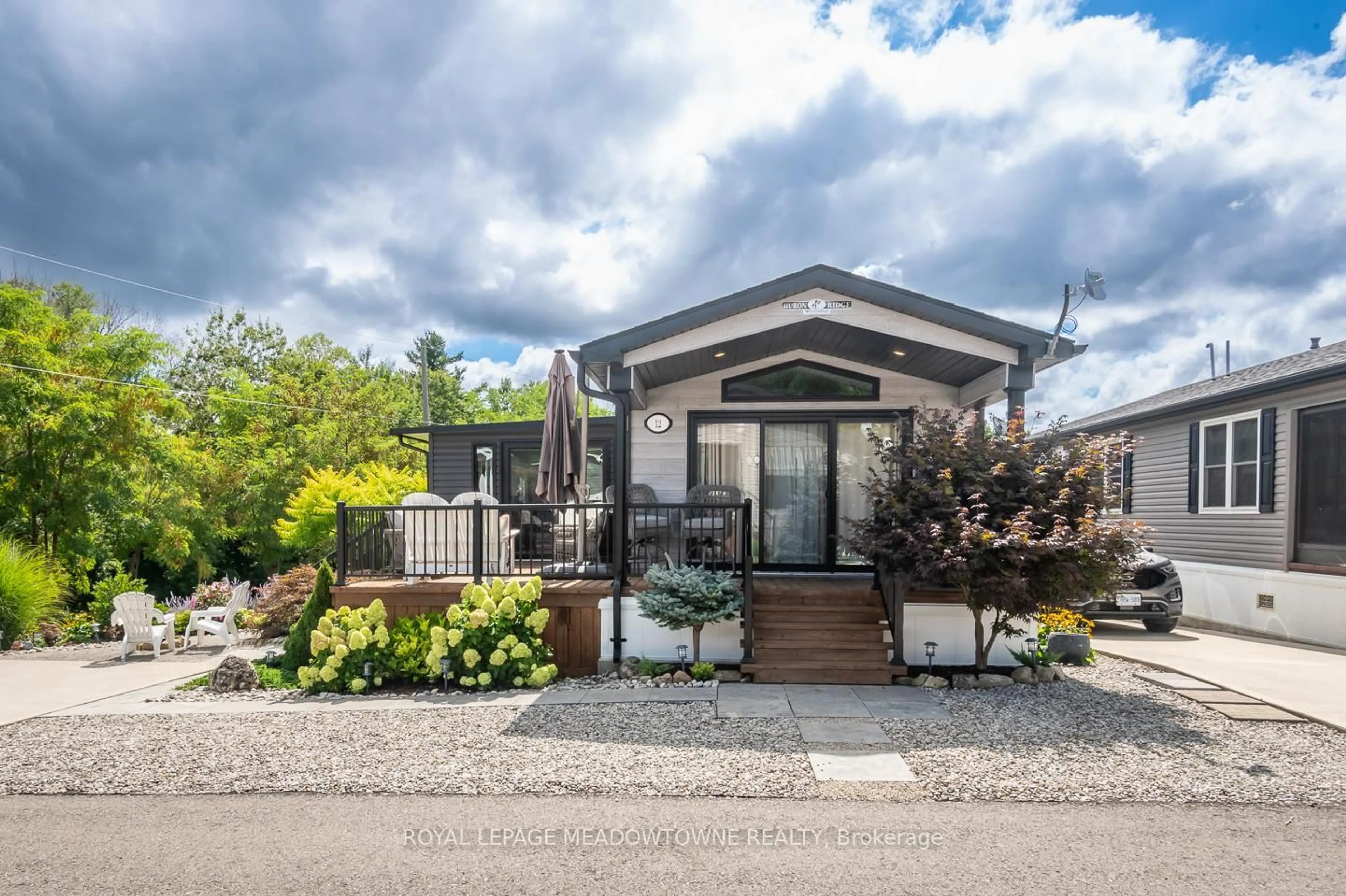 Home with vinyl exterior material, street for 4449 Milburough Line #12 Poplar, Burlington Ontario L7P 0C5