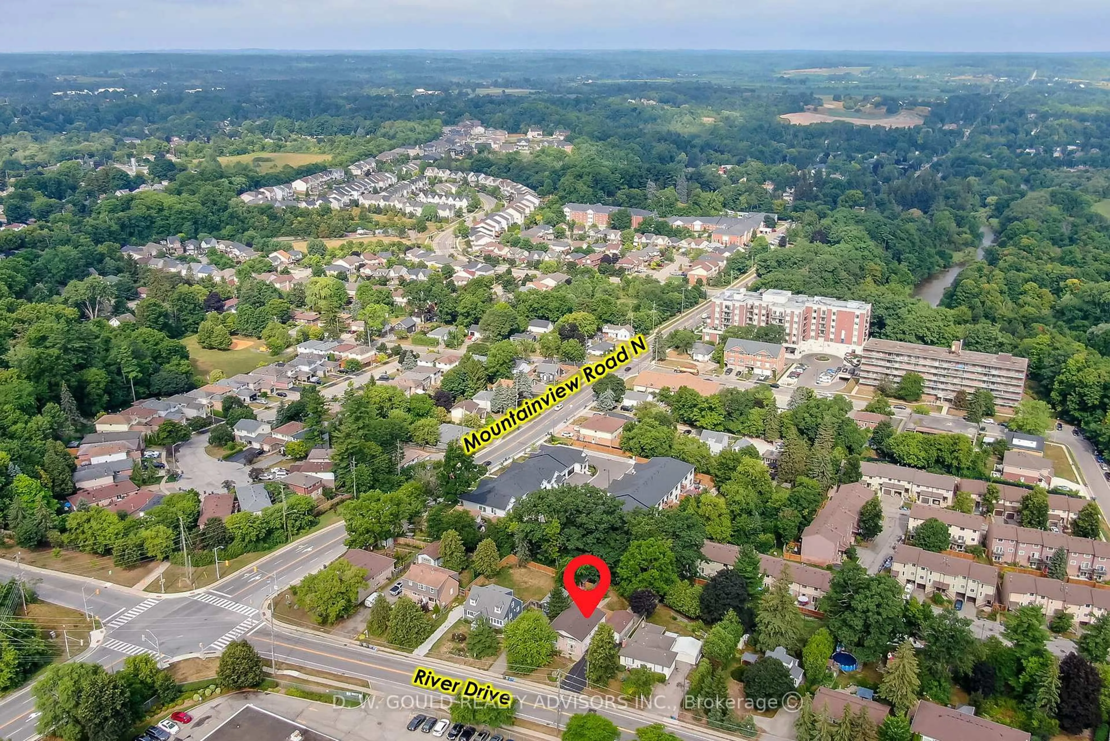 A pic from outside/outdoor area/front of a property/back of a property/a pic from drone, street for 42 River Dr, Halton Hills Ontario L7G 2J2