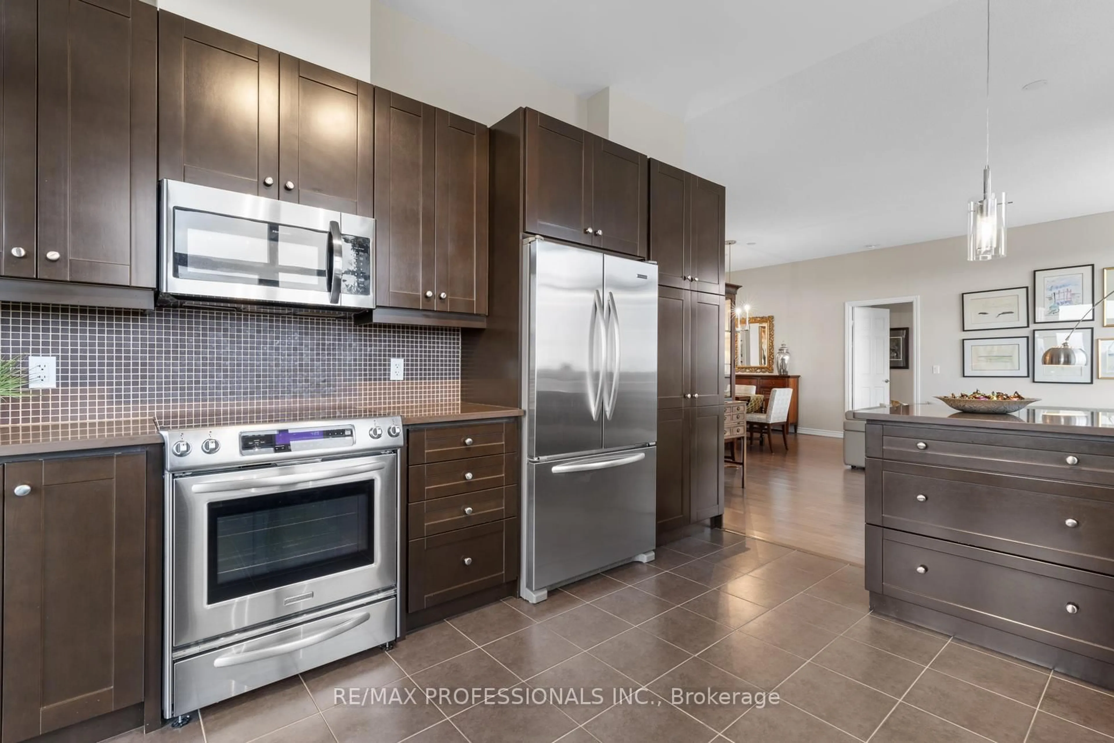 Open concept kitchen, ceramic/tile floor for 1135 Royal York Rd #1203, Toronto Ontario M9A 0C3